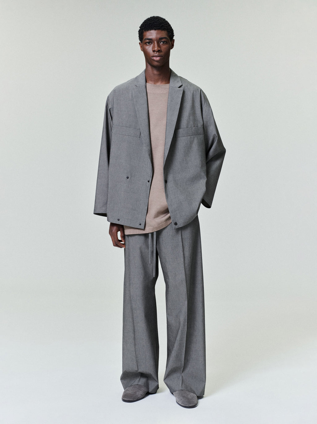 front view of relaxed-fit cotton-wool oxford shirt jacket in grey with two snap buttons and matching wide-leg pants