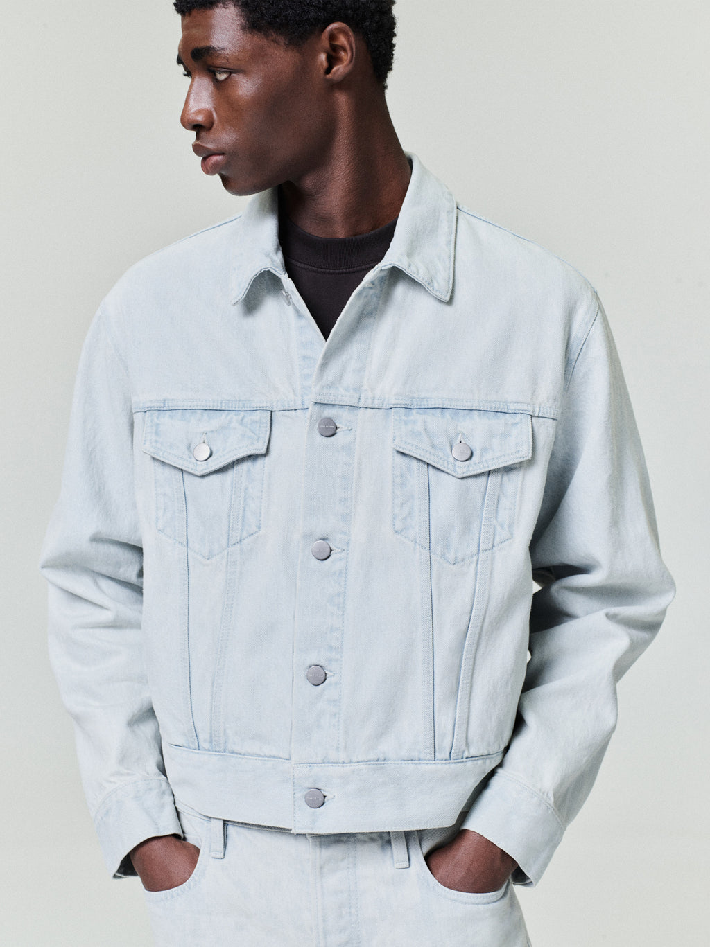 men's bleached denim trucker jacket with chest flap pockets and metal shank buttons, classic fit from Japan