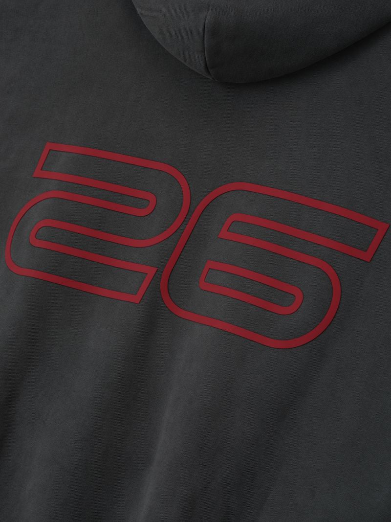 Black hoodie with red number '26' design on a dark background