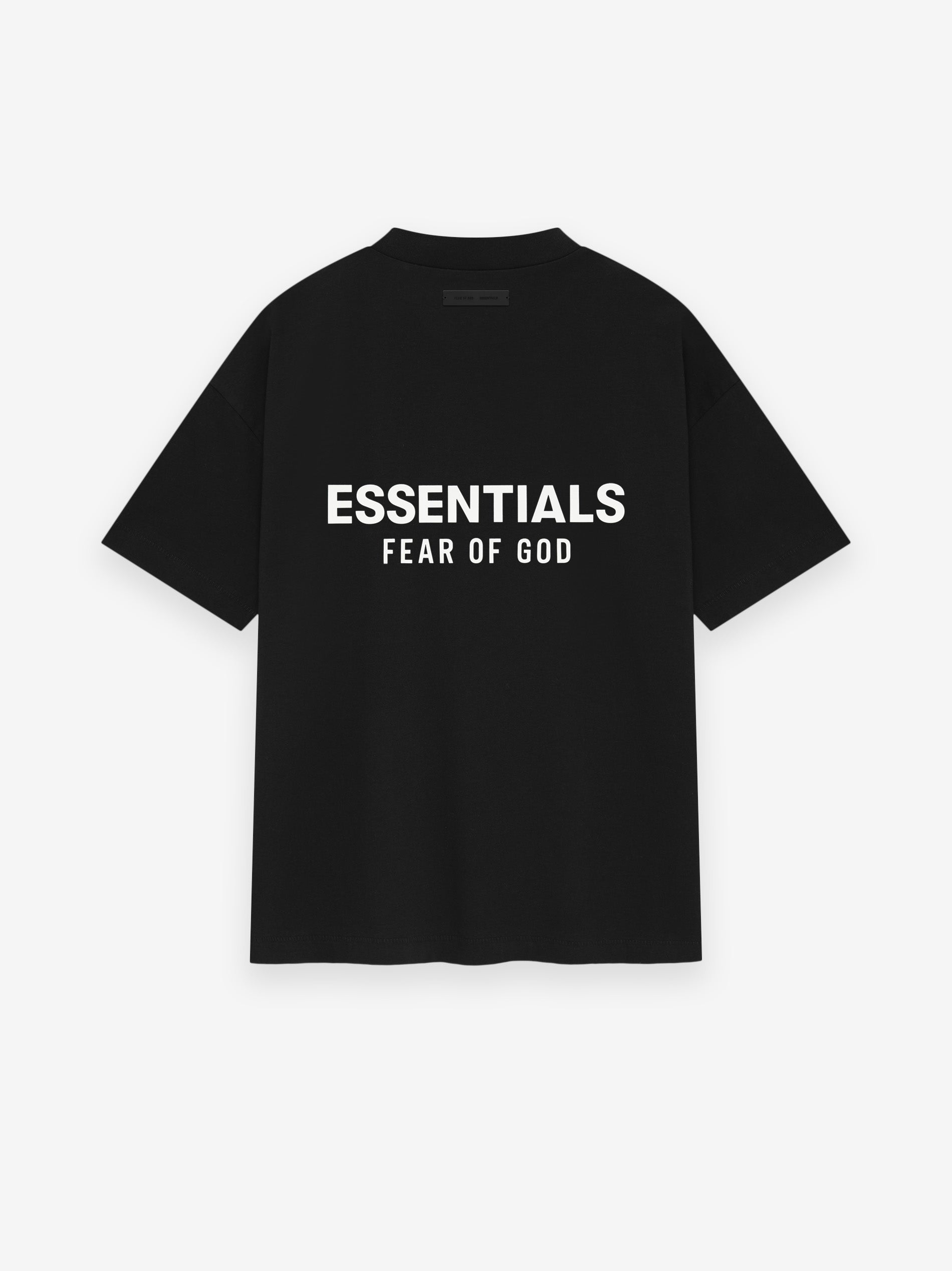 Back view of jet black Classic Short Sleeve Tee with large white ESSENTIALS Fear of God logo centered on back, gallery image 0