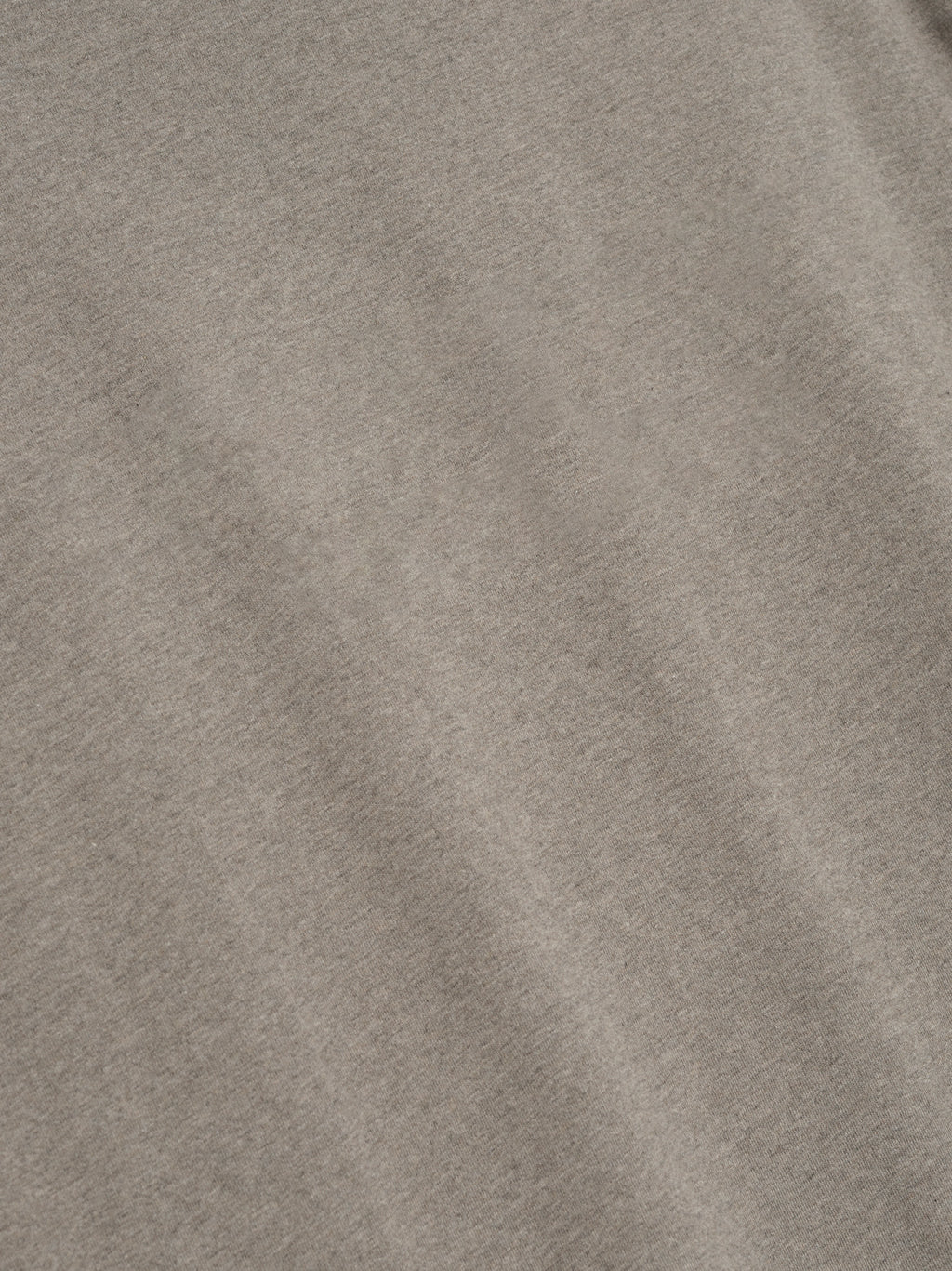 close-up of taupe medium-weight cotton jersey fabric with soft texture from Essentials SS26 Classic Long Sleeve Tee