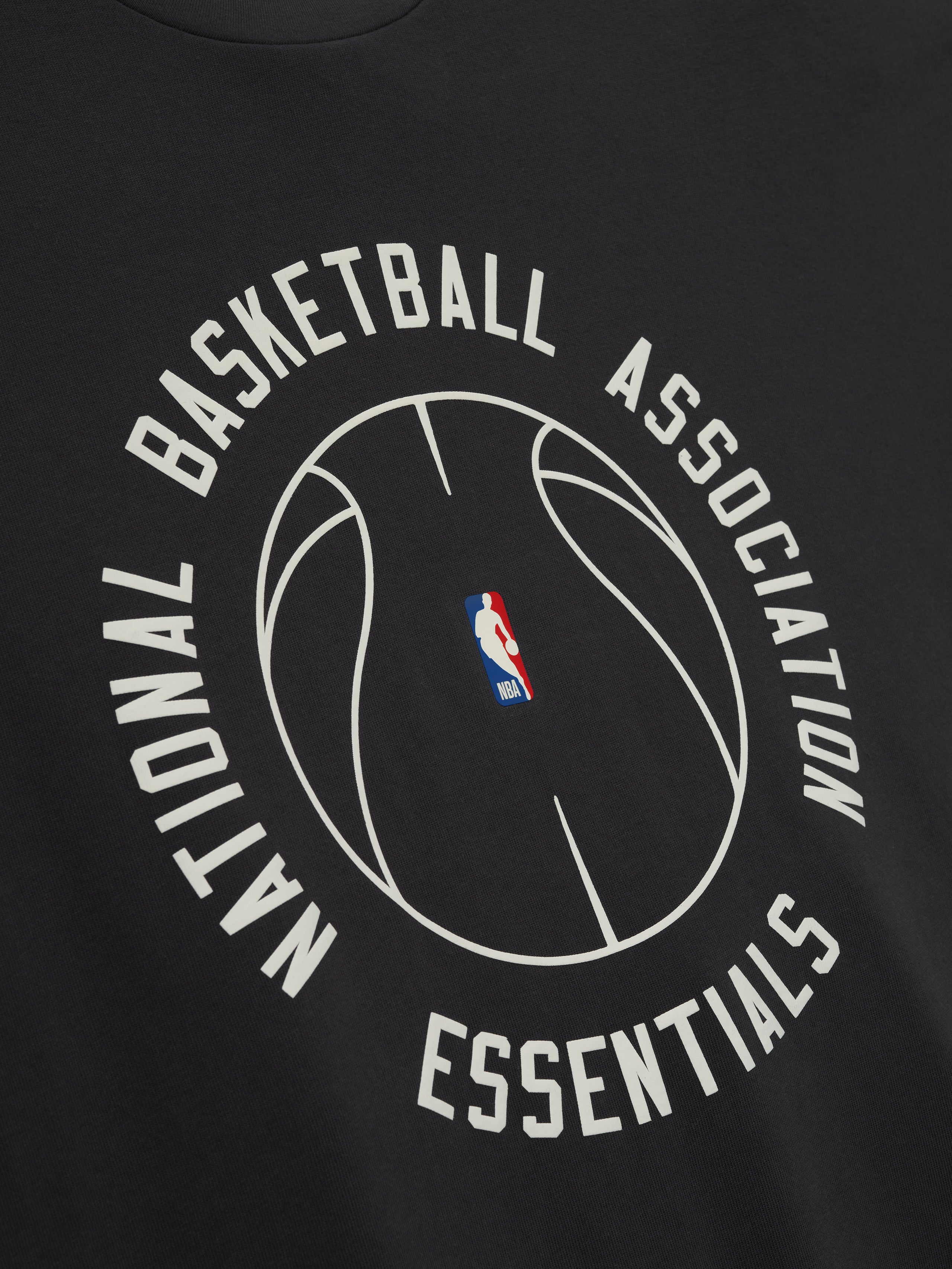 black heavy cotton jersey tee with circular National Basketball Association graphic and small NBA logo in center