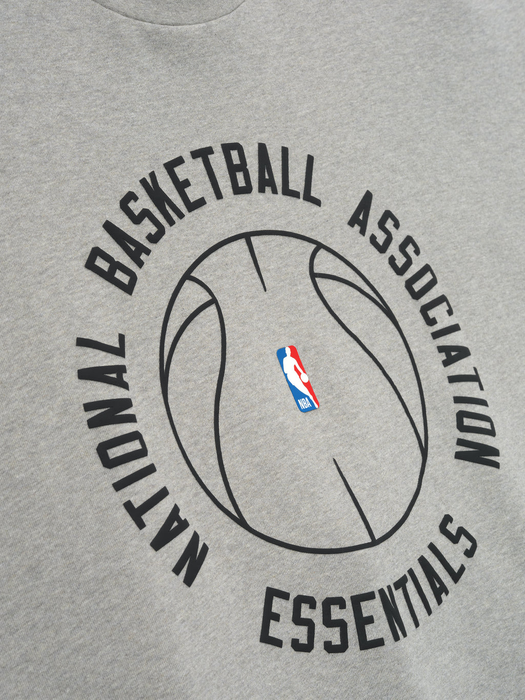 light grey heavyweight cotton jersey tee with large black NBA basketball outline and Essentials text on front