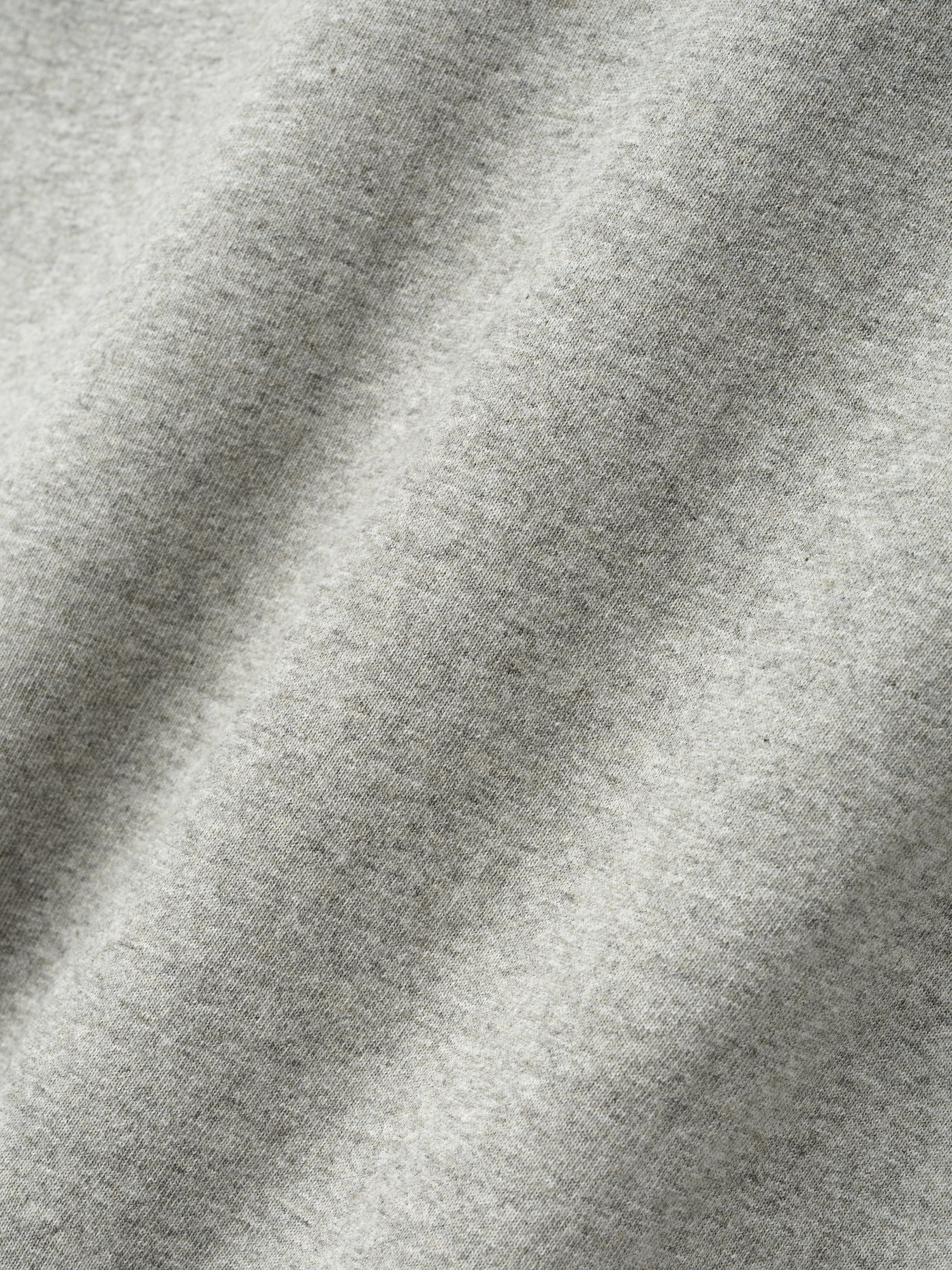 Close-up of concrete heather fabric texture on London 90s Fit Tee, file 125EU264202F, gallery image 0
