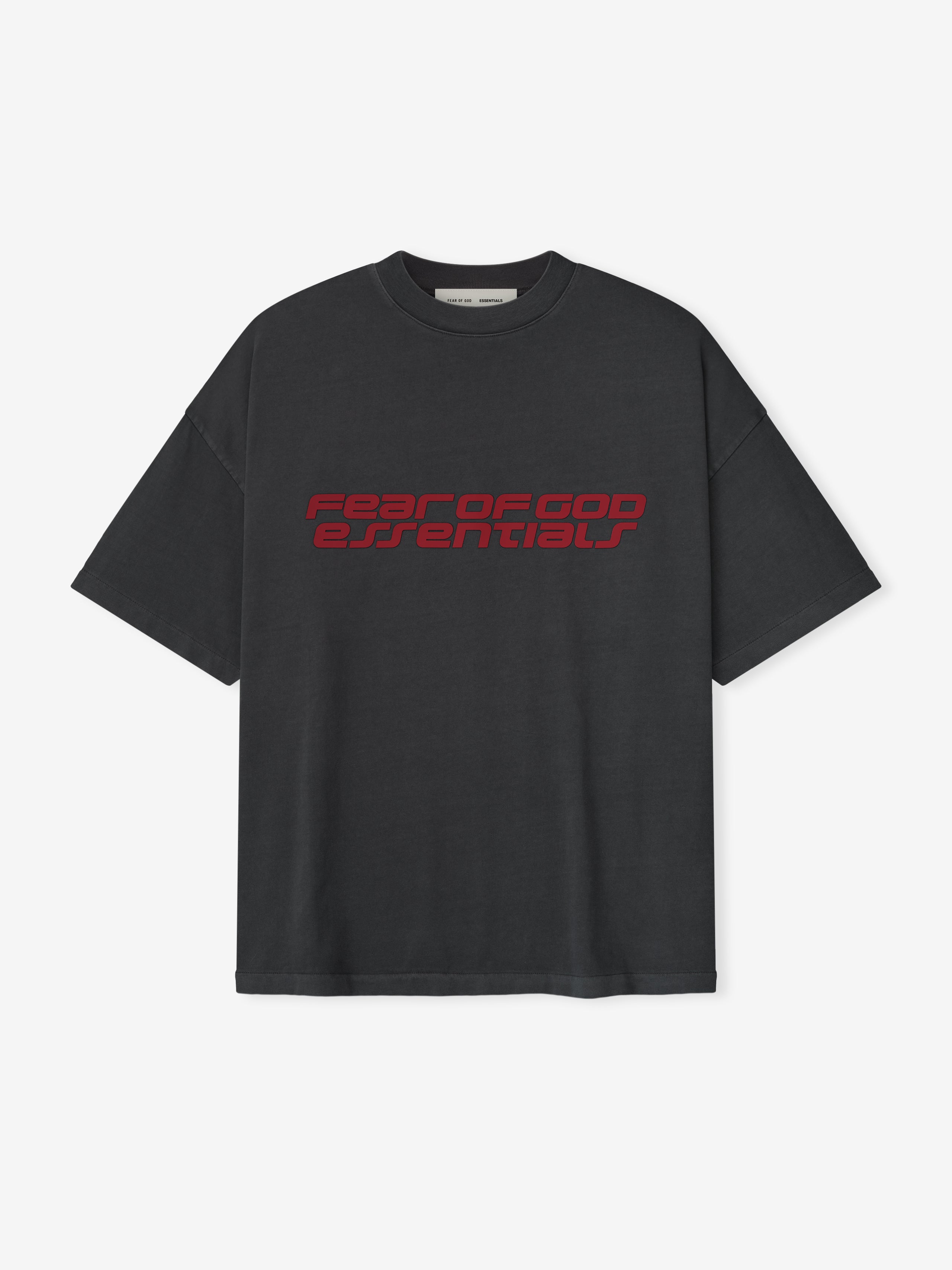 Iron grey Fear of God Essentials 90s Tee with bold red logo text across chest, flat lay front view, gallery first image