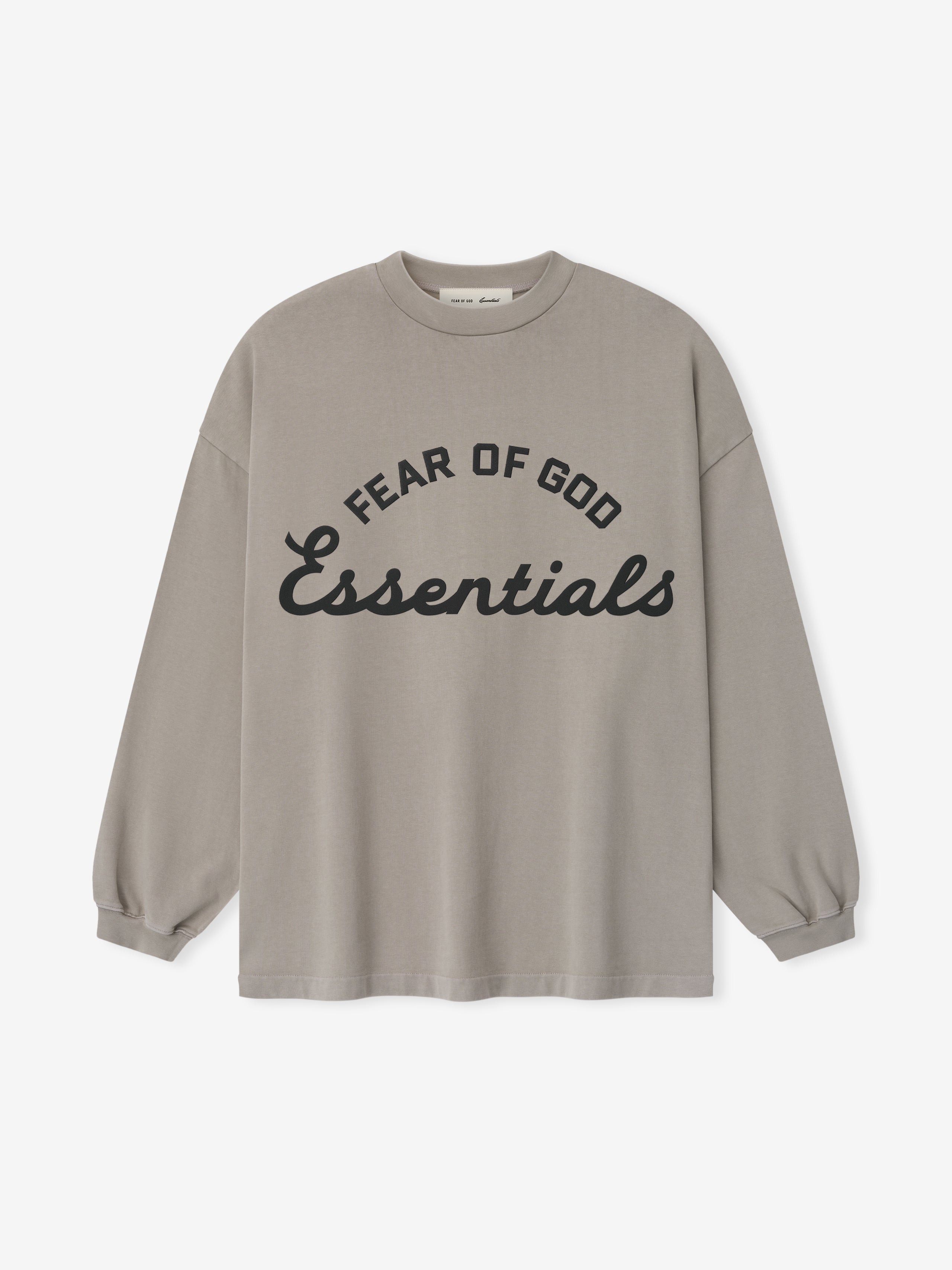 oversized long sleeve tee in heavyweight cotton with pigment-dye finish and curved Fear of God Essentials logo front