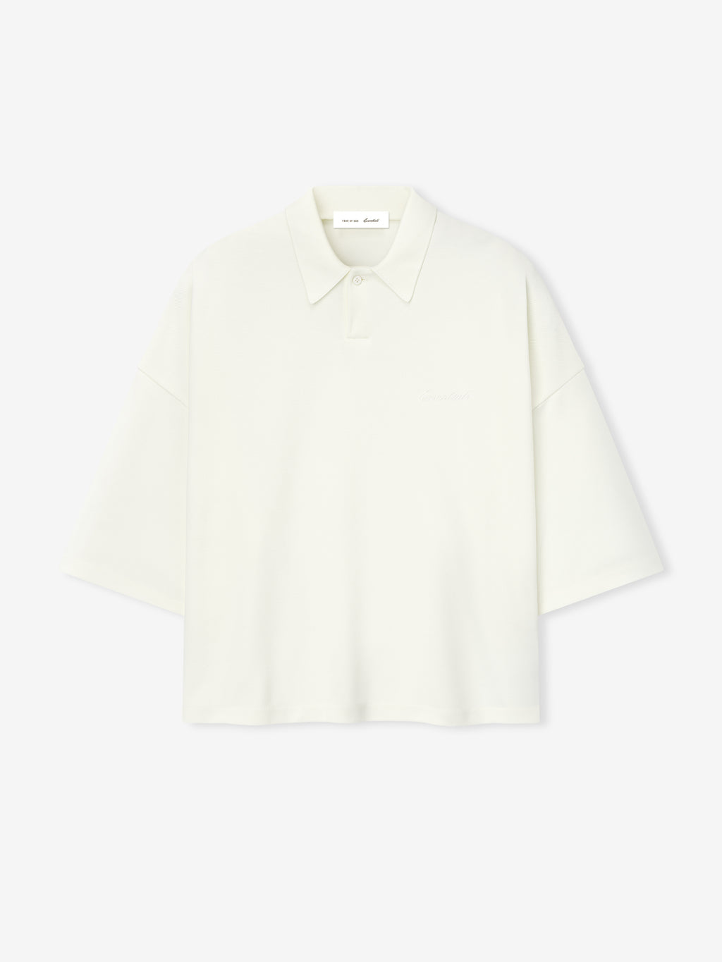 off-white medium-weight cotton poly pique cropped polo with minimalist collar and oversized 90s fit sleeves