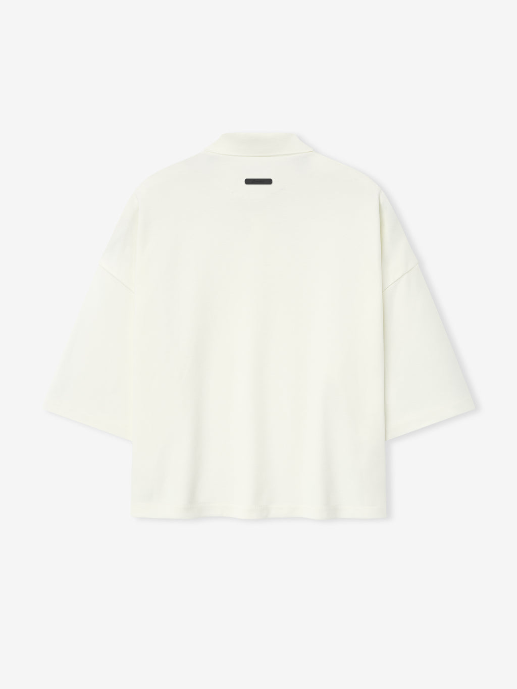 back view of off-white medium-weight cotton poly pique cropped polo with oversized 90s fit and wide 3/4 sleeves