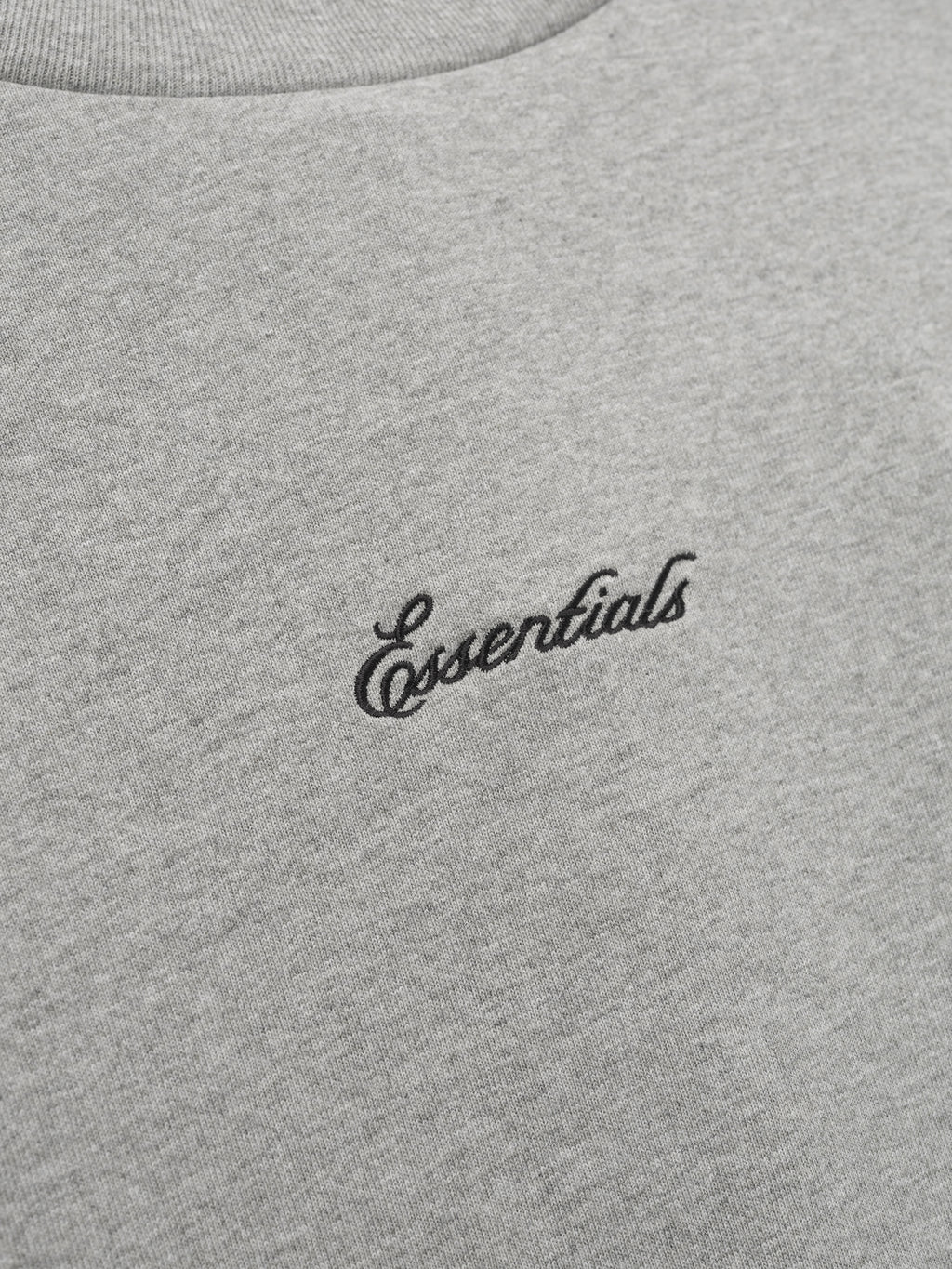Gray t-shirt with 'essentials' logo.