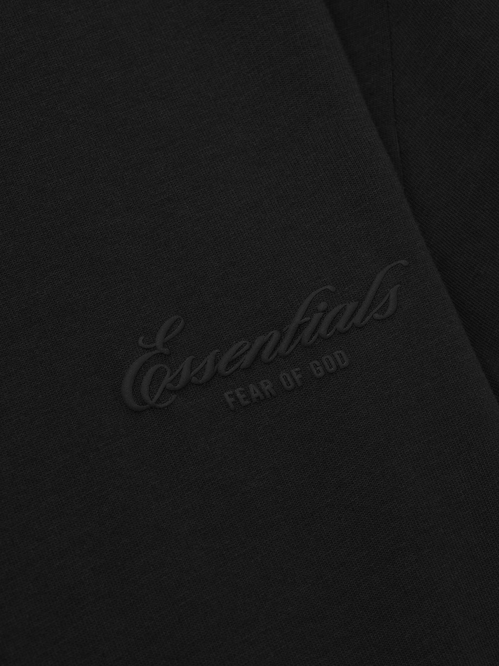 black cotton jersey fabric with subtle tonal puff-printed Essentials Fear of God logo detail