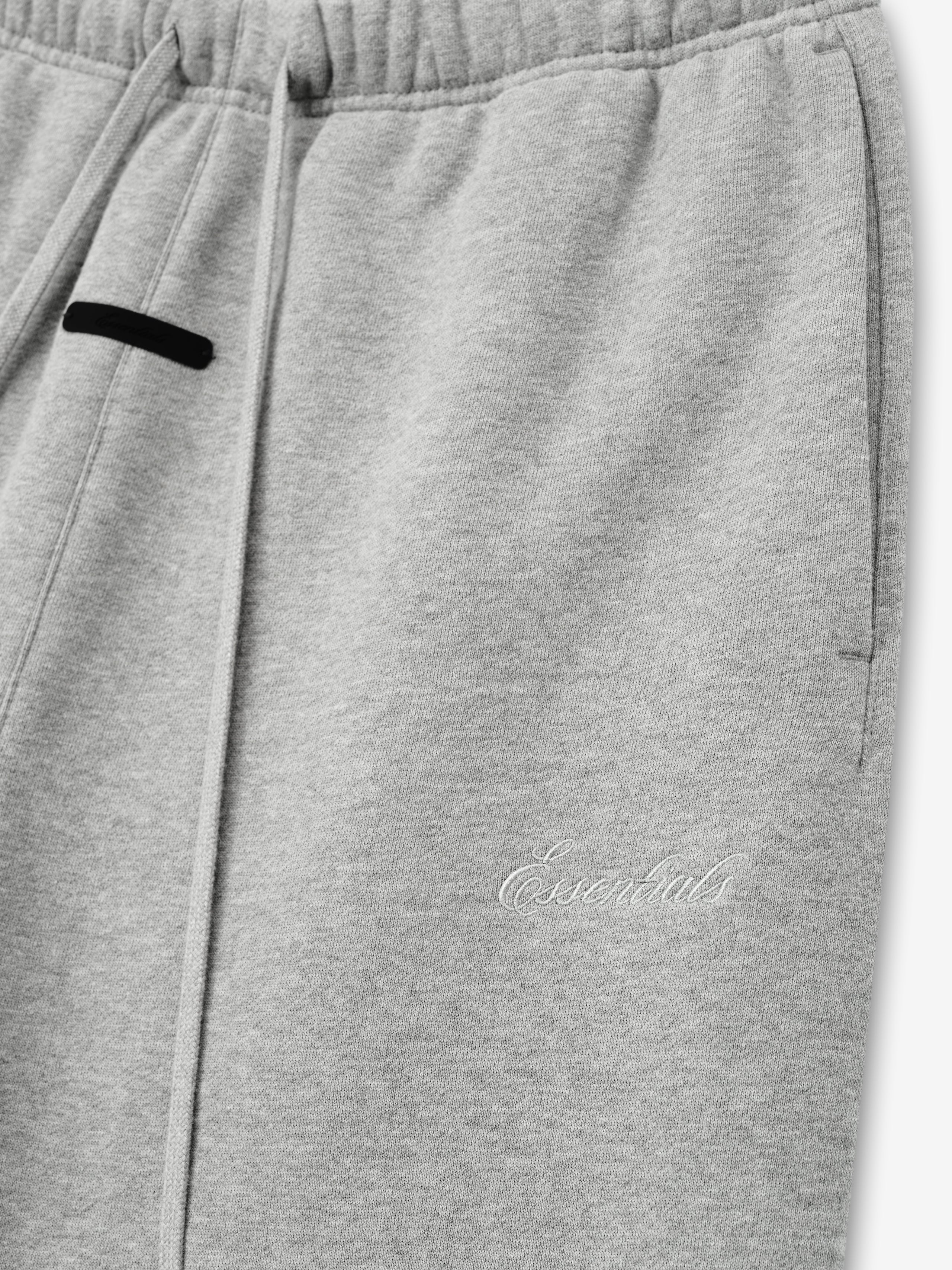 Gray sweatpants with a brand logo on a white background