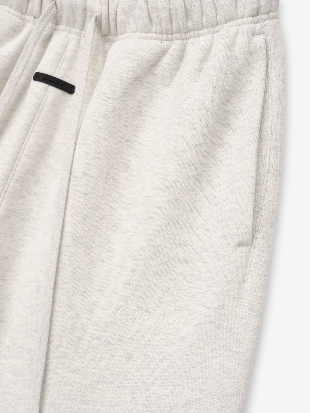 off-white women's relaxed silhouette classic flare sweatpants in 380GSM core fleece with elastic waistband and embroidered Essentials logo