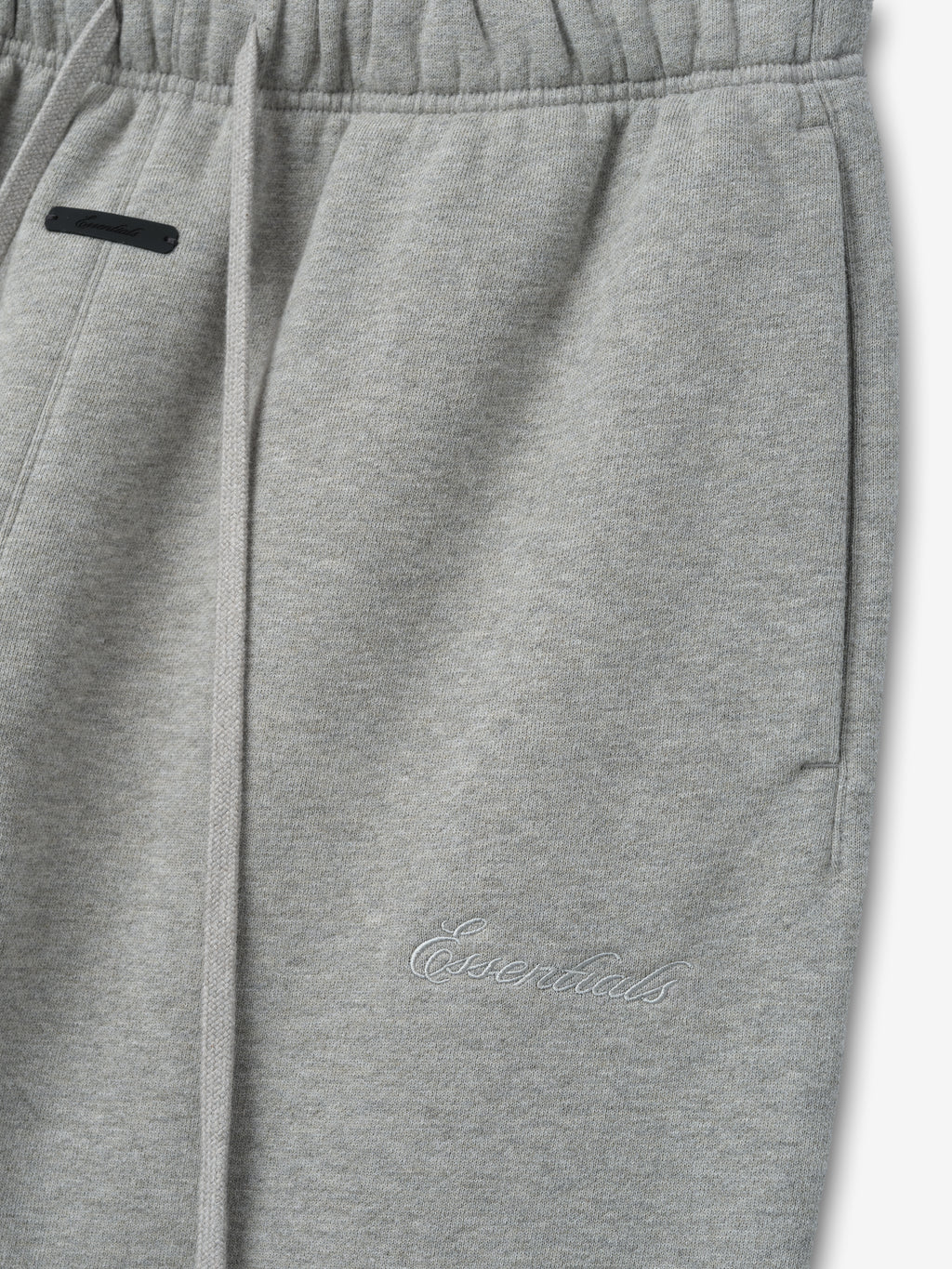Gray sweatpants with a brand logo on a white background