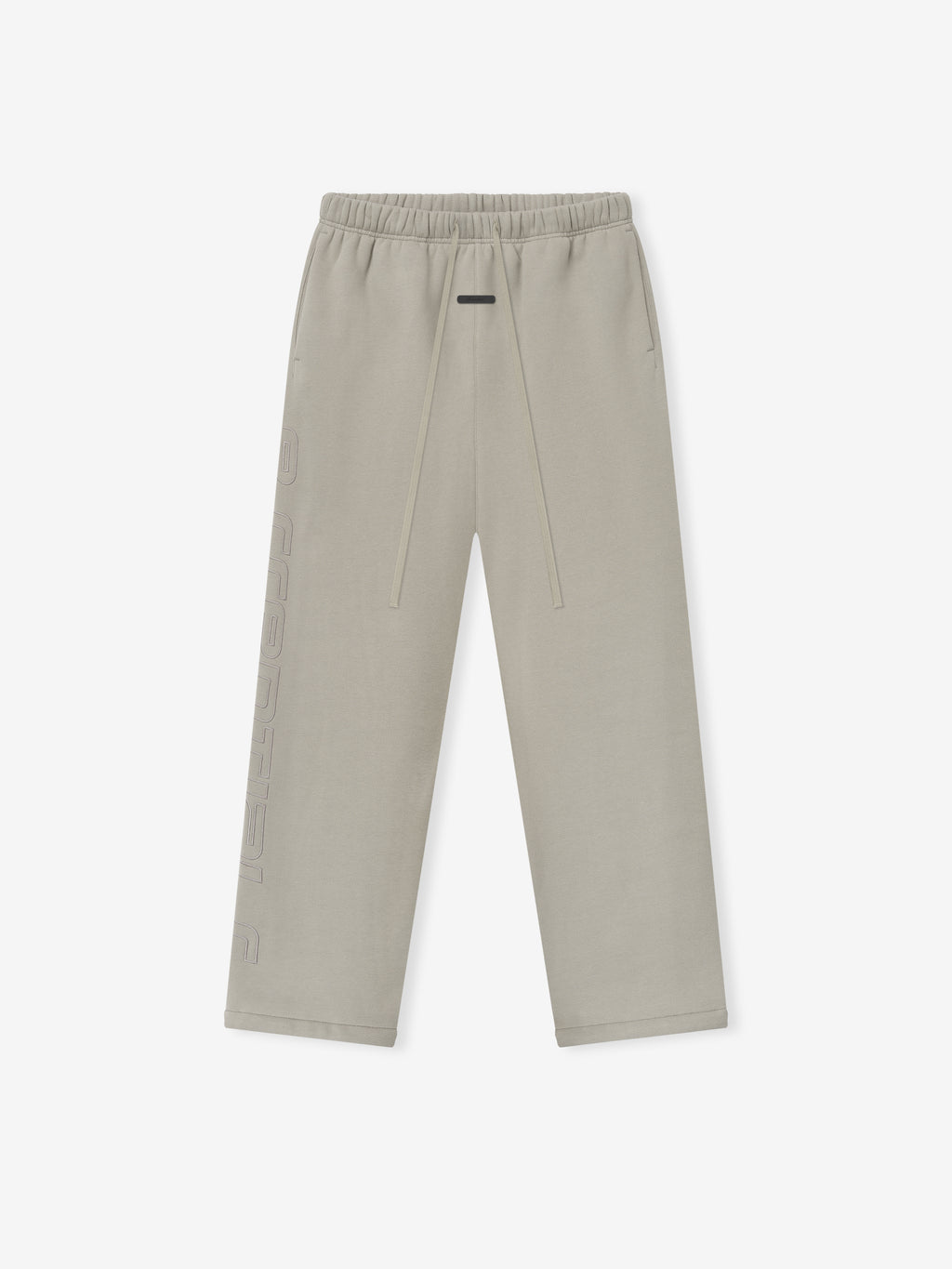 light beige relaxed fit sweatpants with elastic waistband, drawstring, and embossed logo detail down the leg