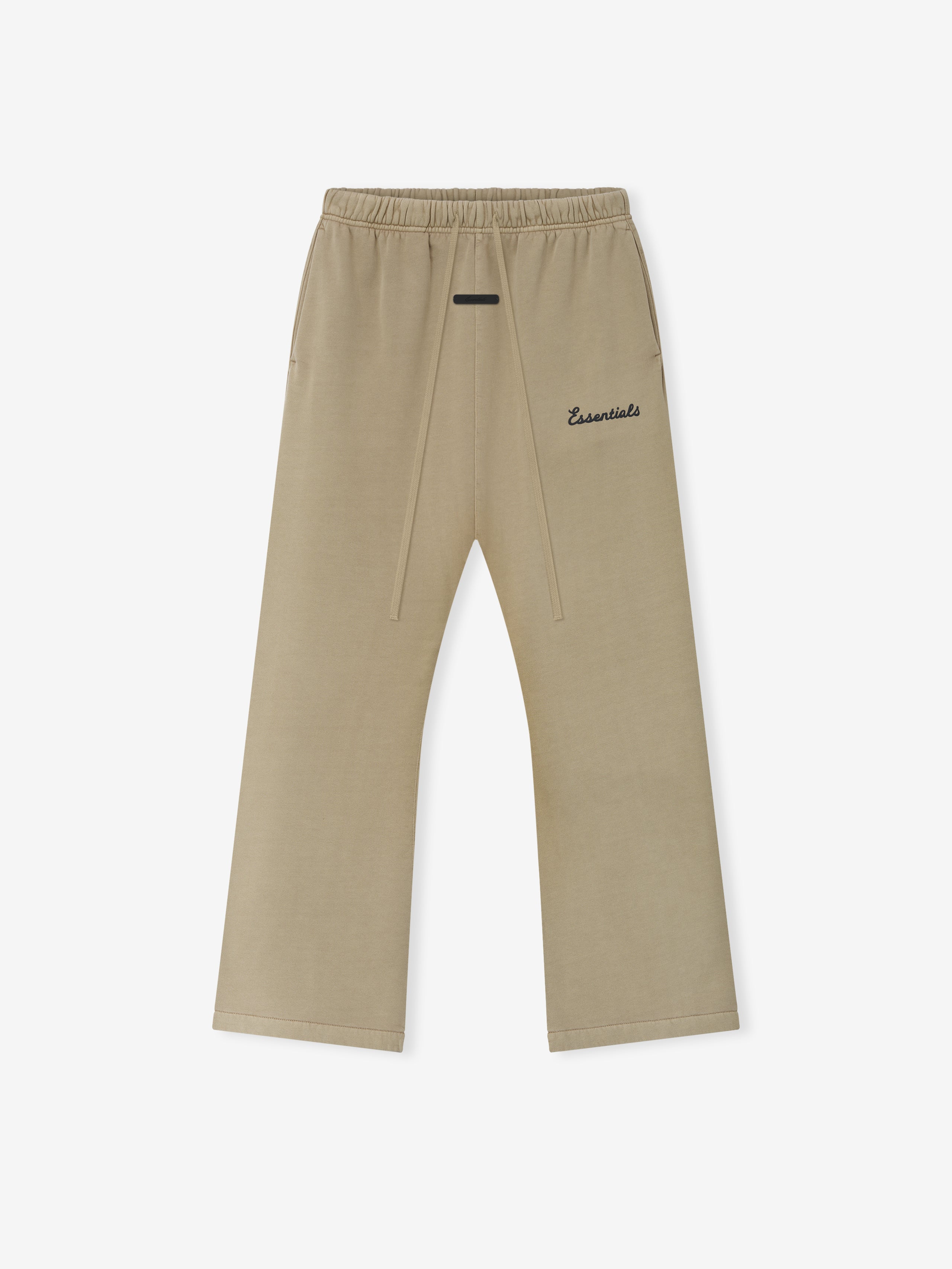 Beige sweatpants with Essentials script logo on a white background