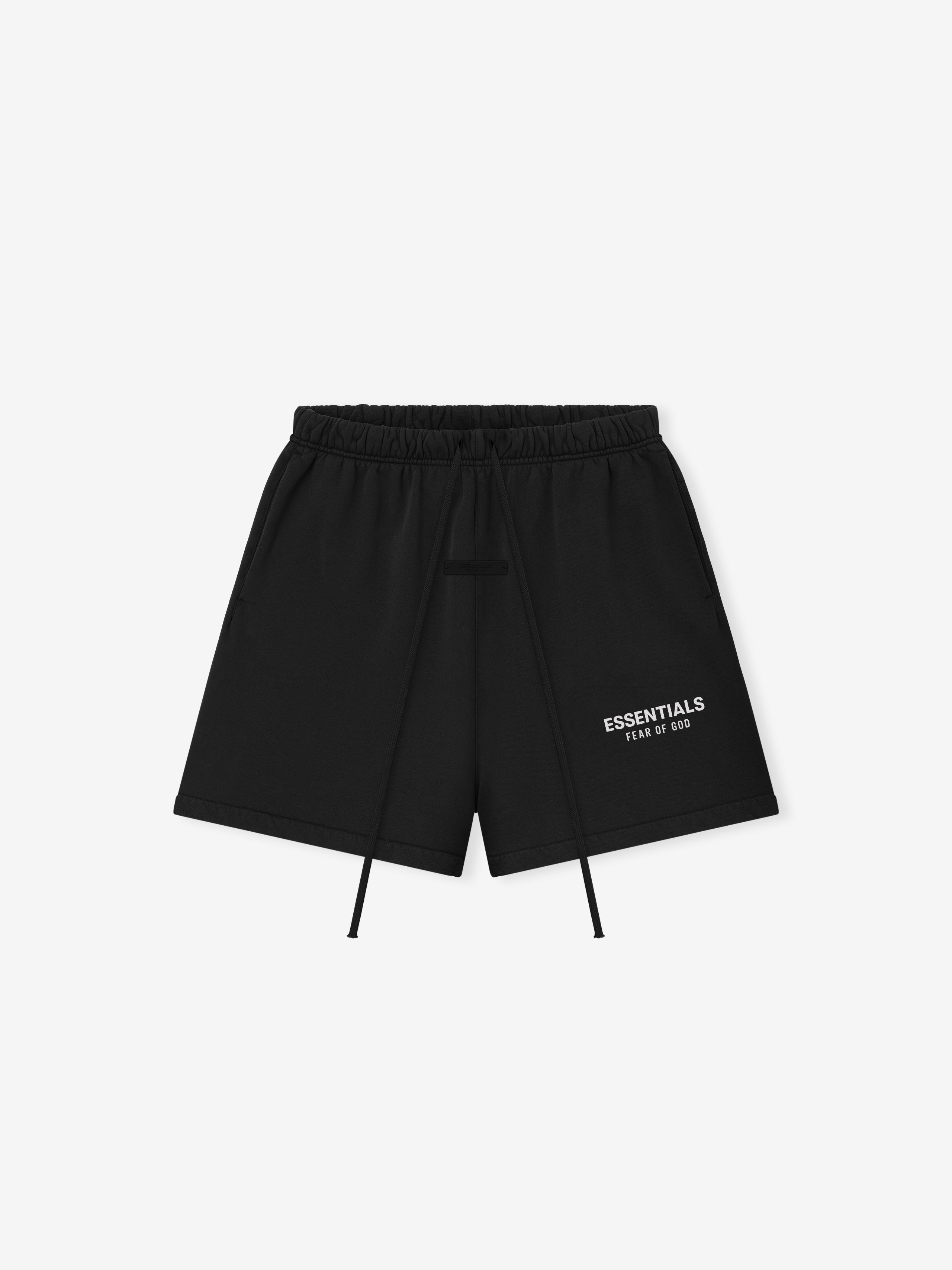 black fleece shorts with elastic waistband, adjustable drawstrings, and Essentials Fear of God logo on leg