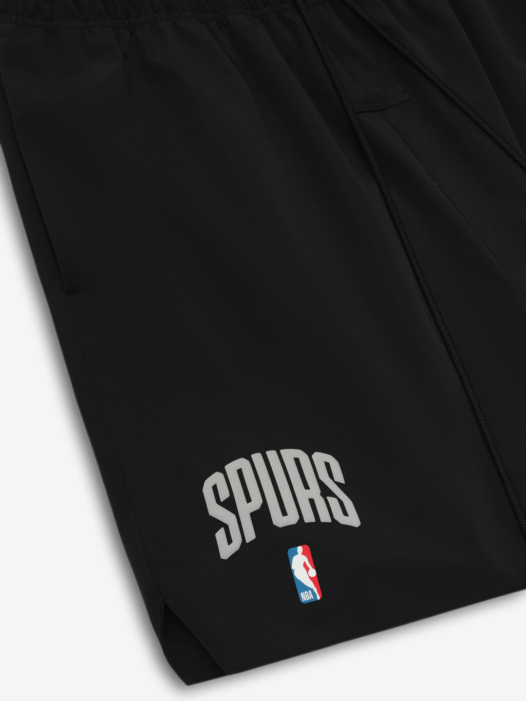 Black Spurs Classic Short close-up showing white arched "SPURS" text and NBA logo near hem in gallery position 0