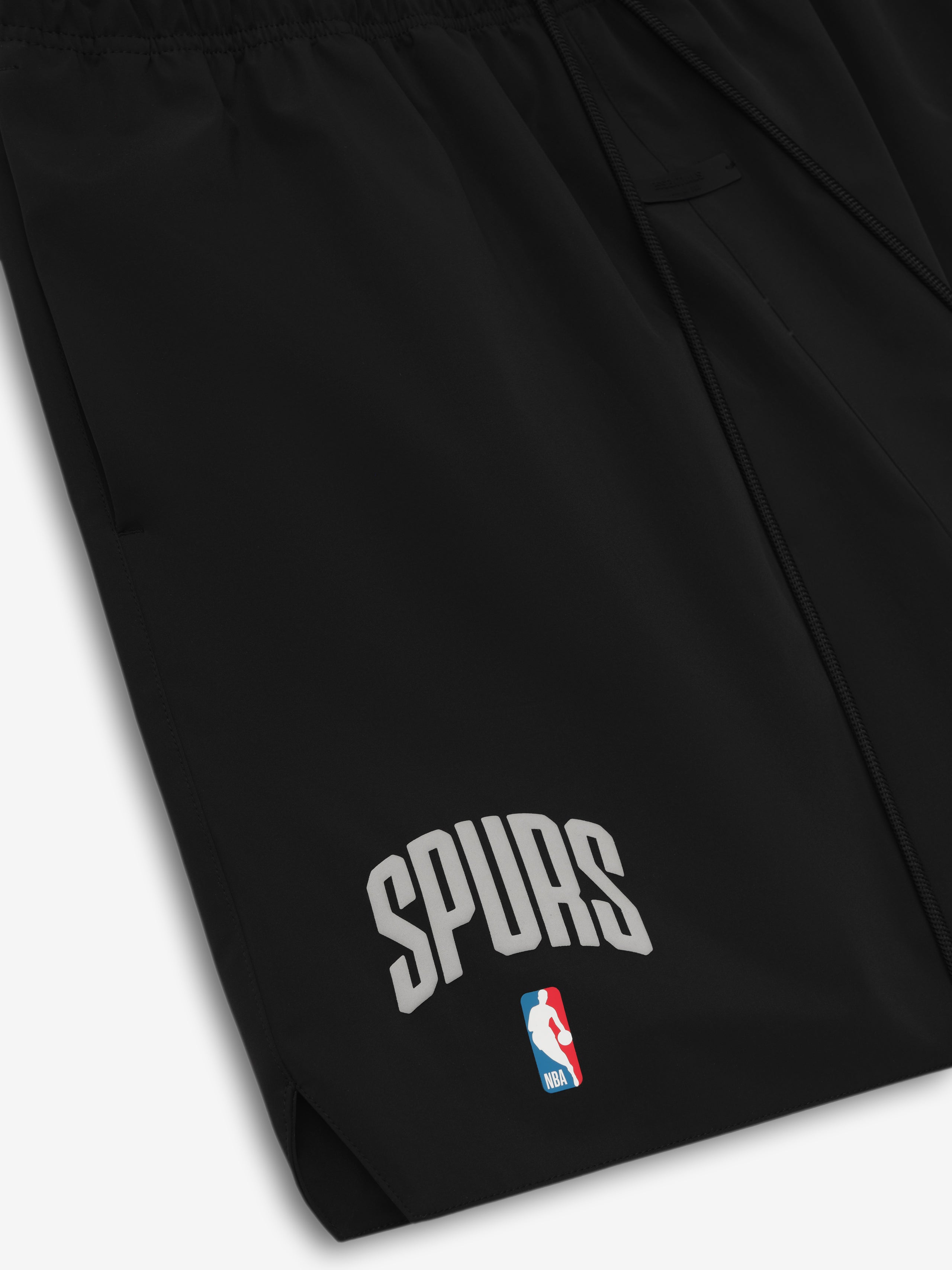 Black Spurs Classic Short close-up showing white arched "SPURS" text and NBA logo near hem in gallery position 0