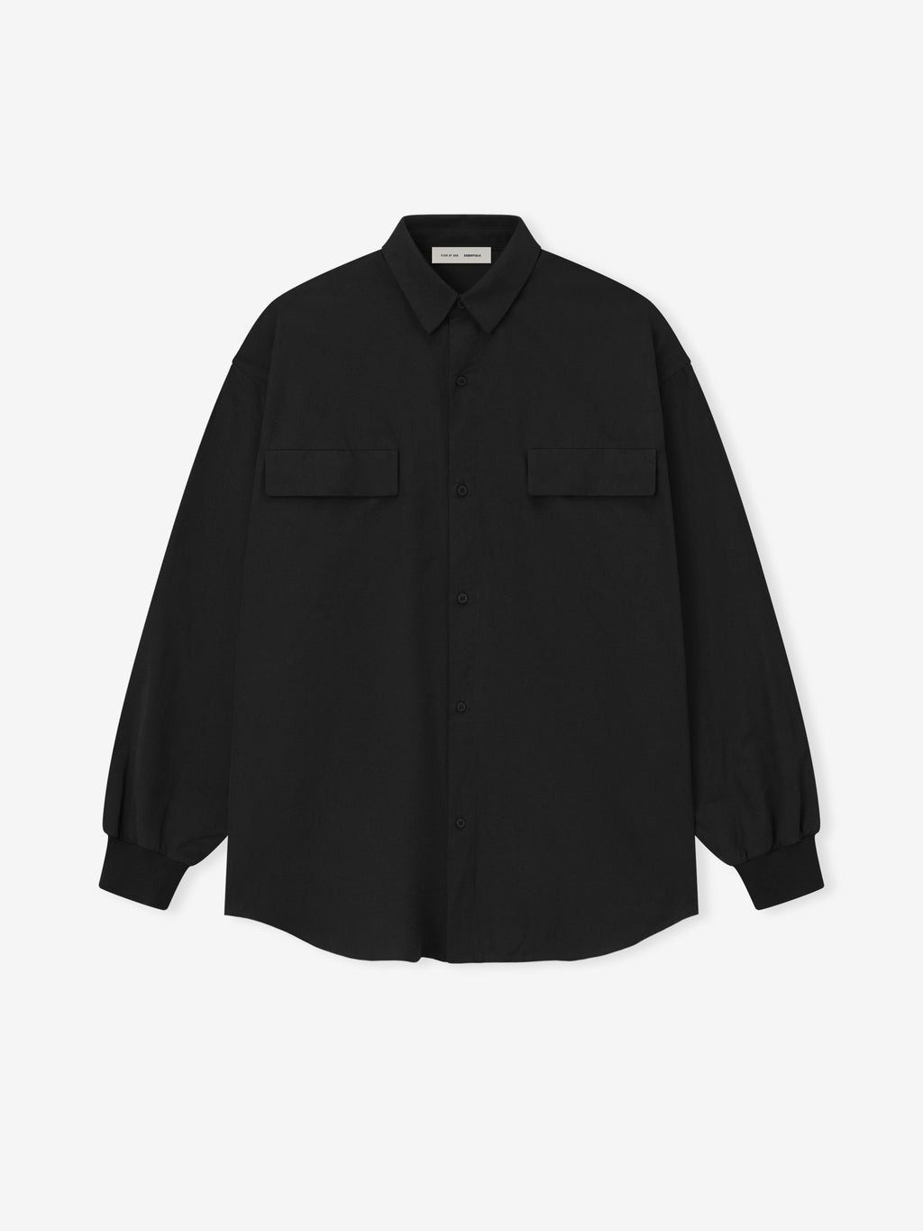 black oversized cotton Oxford shirt with long sleeves and flap pockets laid flat on white background