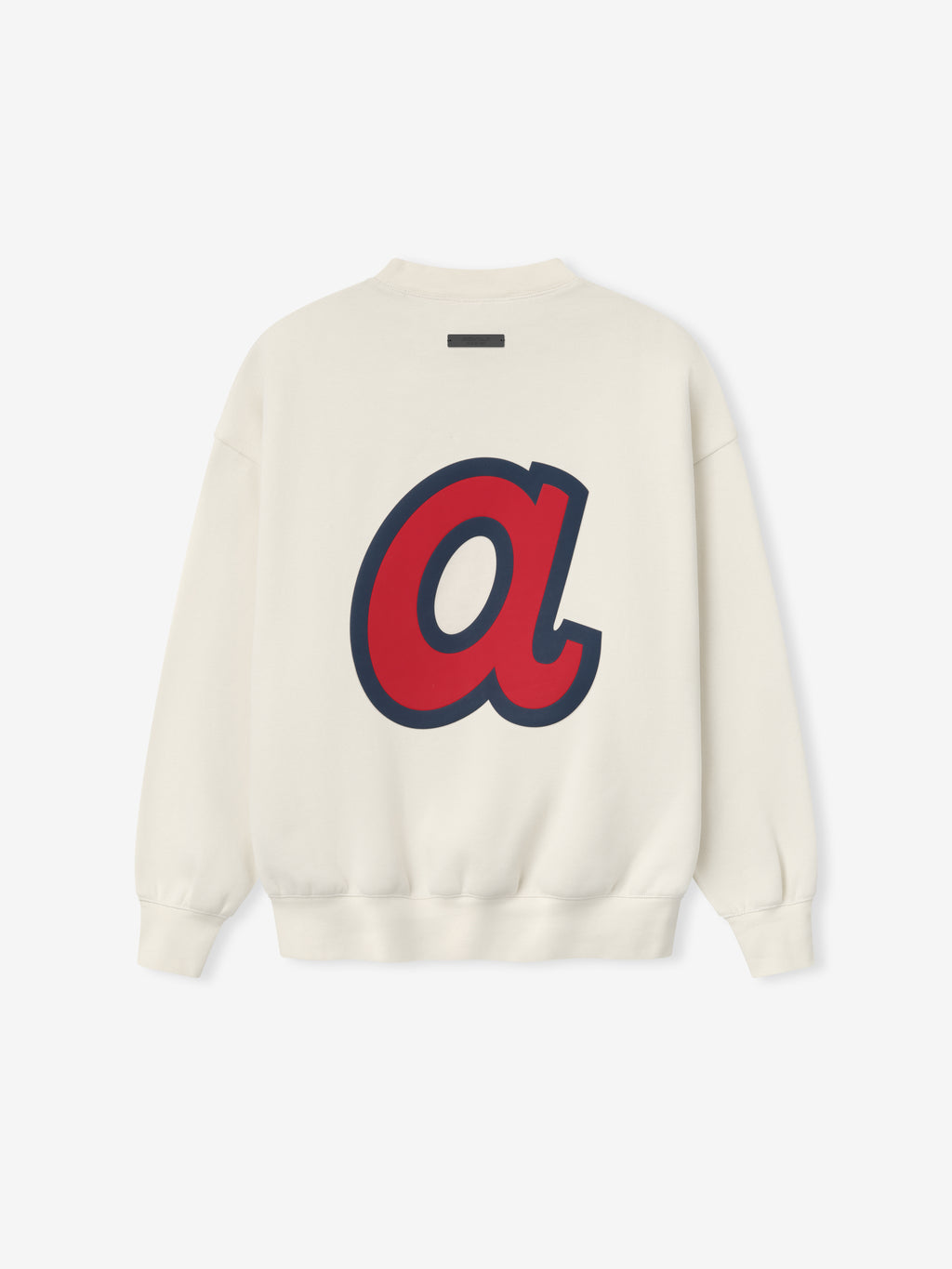 Off-white crewneck sweatshirt showing large red lowercase "a" outlined in navy centered on back fabric