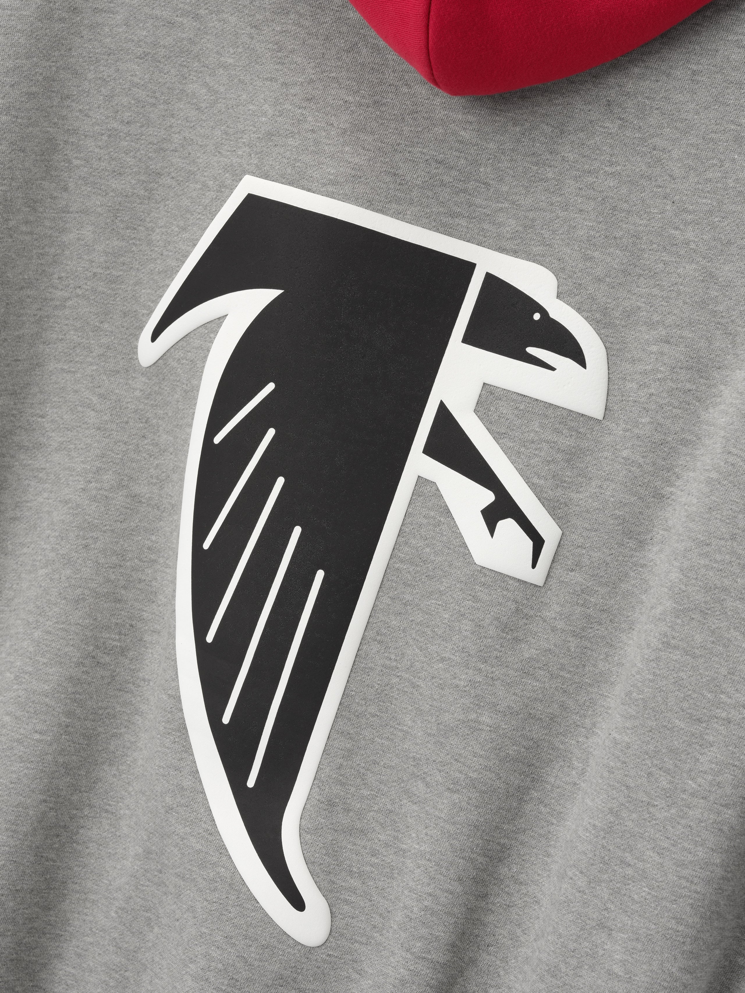 Close-up of heather grey hoodie fabric featuring large abstract black and white falcon graphic on front panel