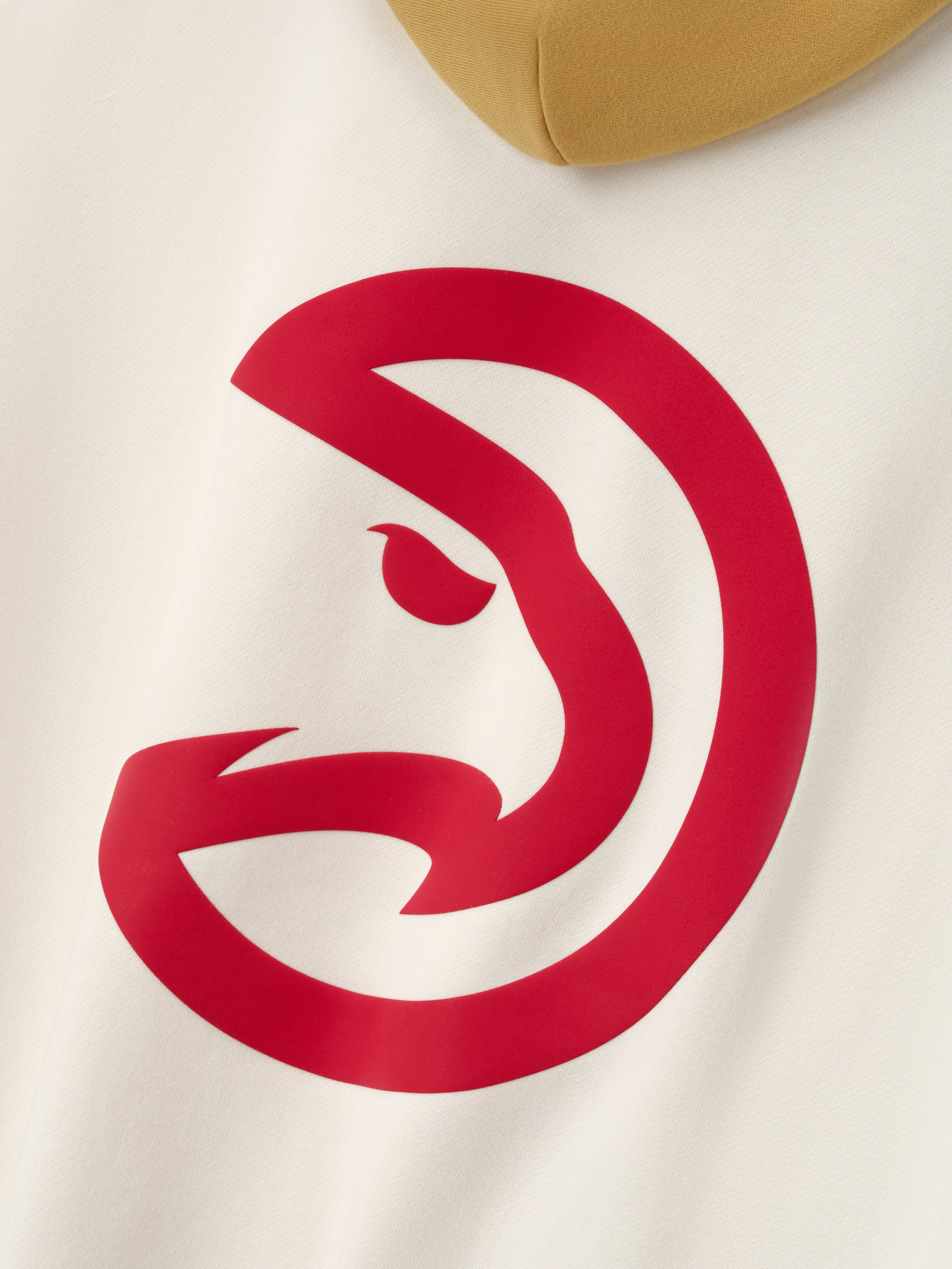 Close-up of white Hawks Sport Hoodie featuring large minimalist red hawk head logo on front center fabric