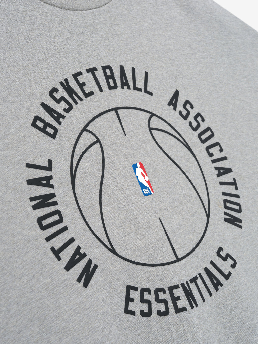light grey crewneck with black outlined basketball graphic and circular National Basketball Association Essentials text on front
