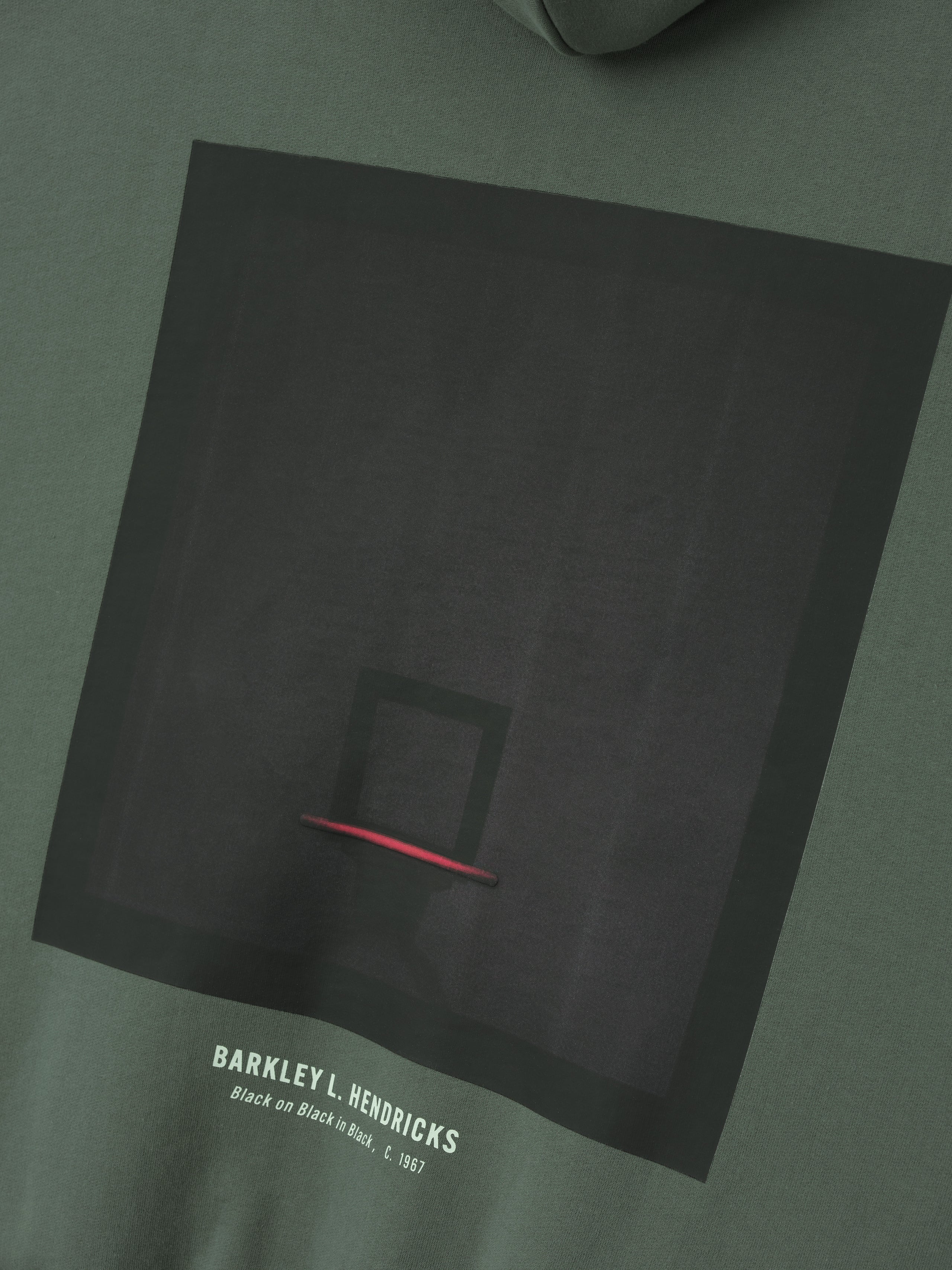 muted green hoodie with black-on-black Barkley Hendricks basketball hoop graphic and text on front center