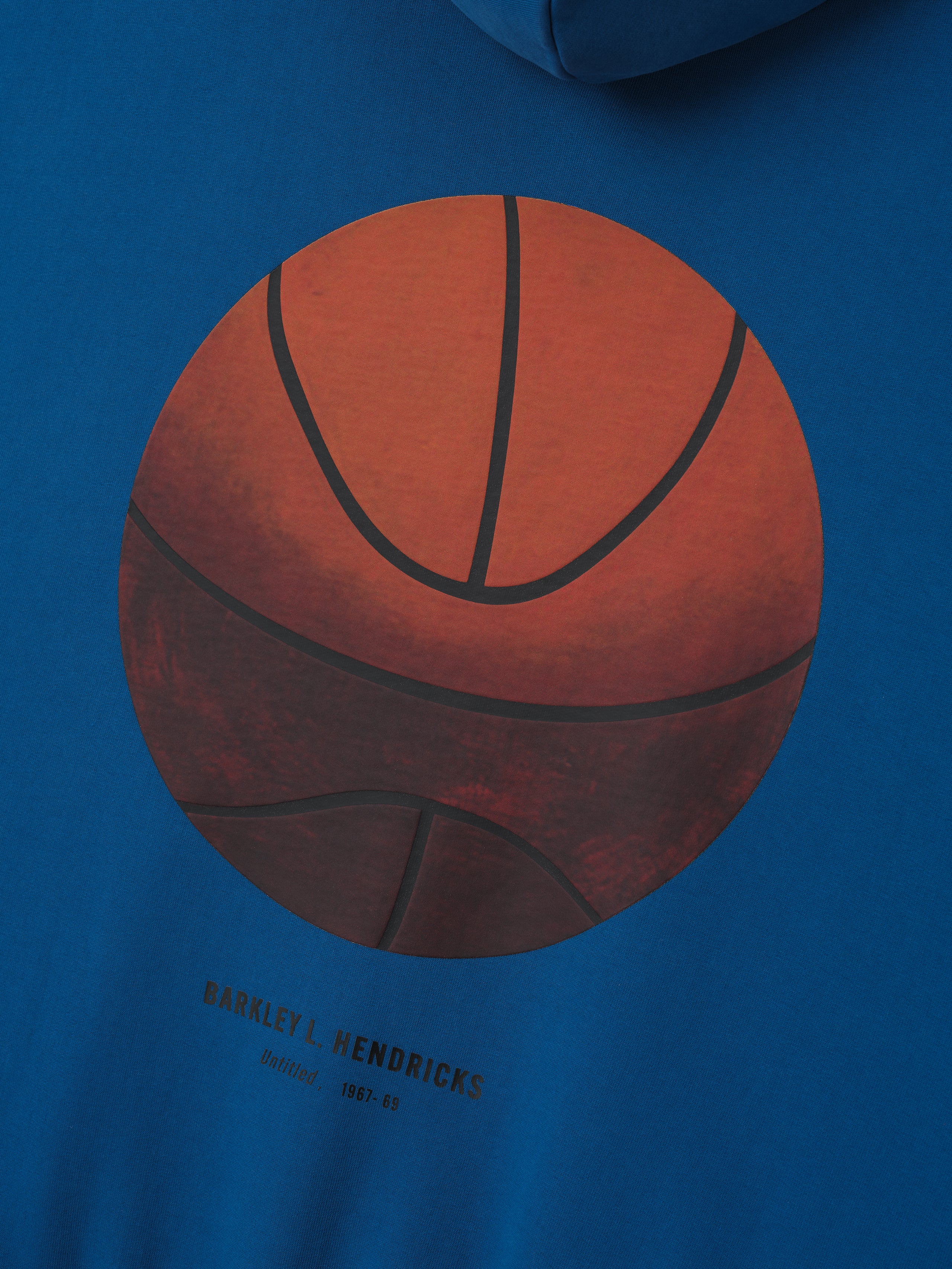 blue heavyweight hoodie with large realistic basketball illustration and Barkley L. Hendricks signature detail below