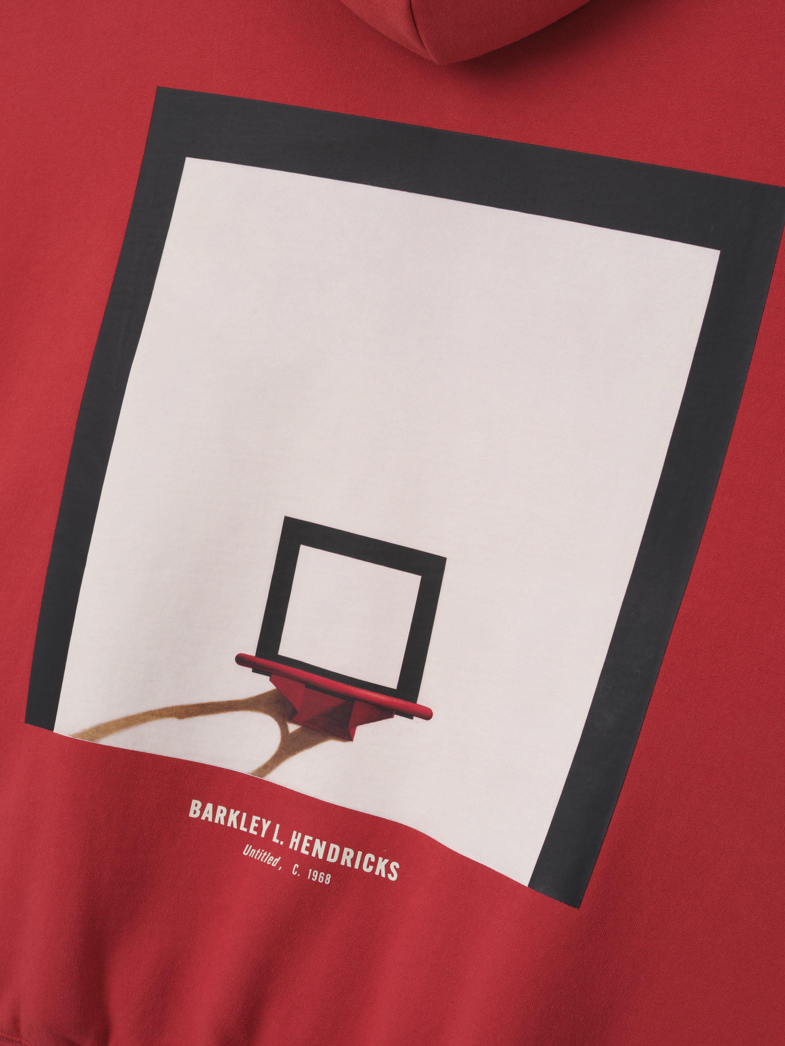 red heavyweight hoodie with framed artistic basketball hoop print and Barkley L. Hendricks text below back center