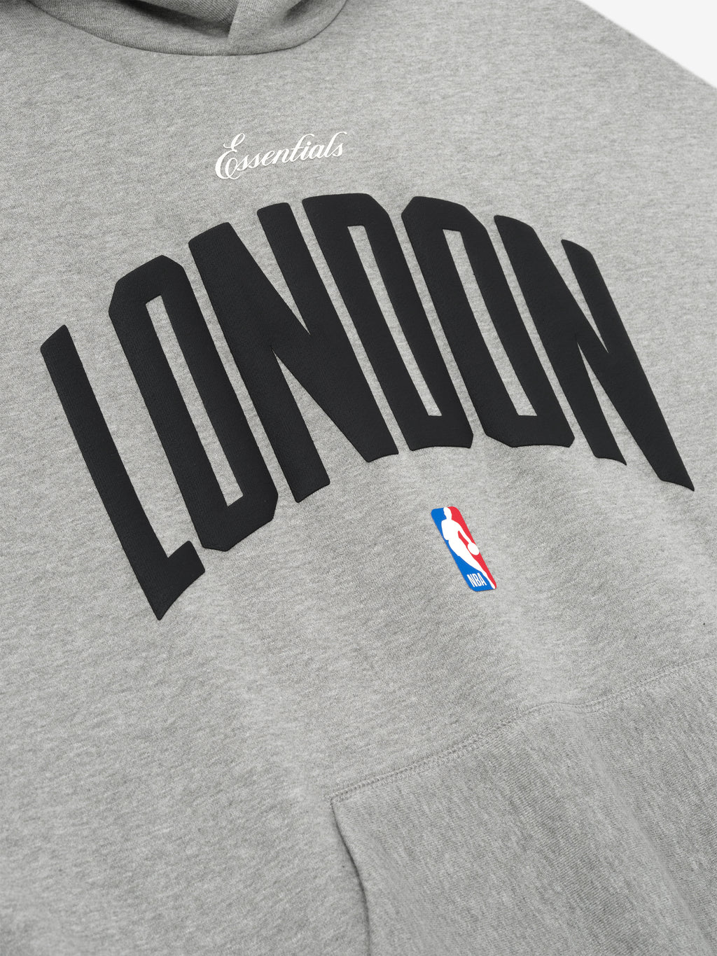 Close-up of concrete heather London 90s Hoodie showing "Essentials" script and NBA logo above front pocket, gallery 0.