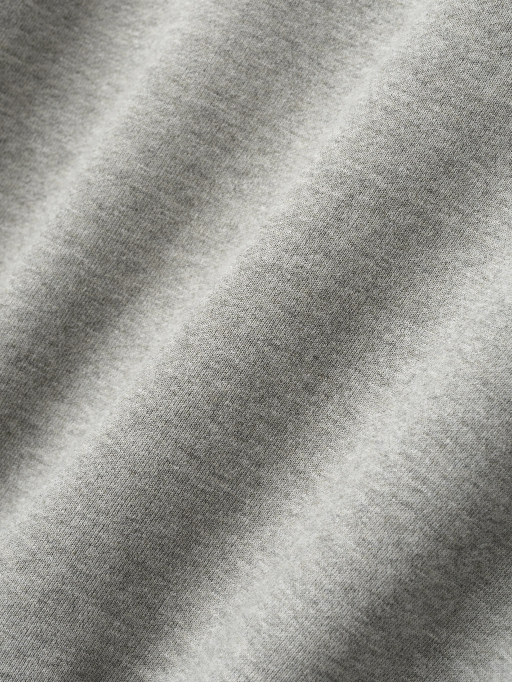Close-up of concrete heather fabric texture detail from London 90s Hoodie, gallery position 0.