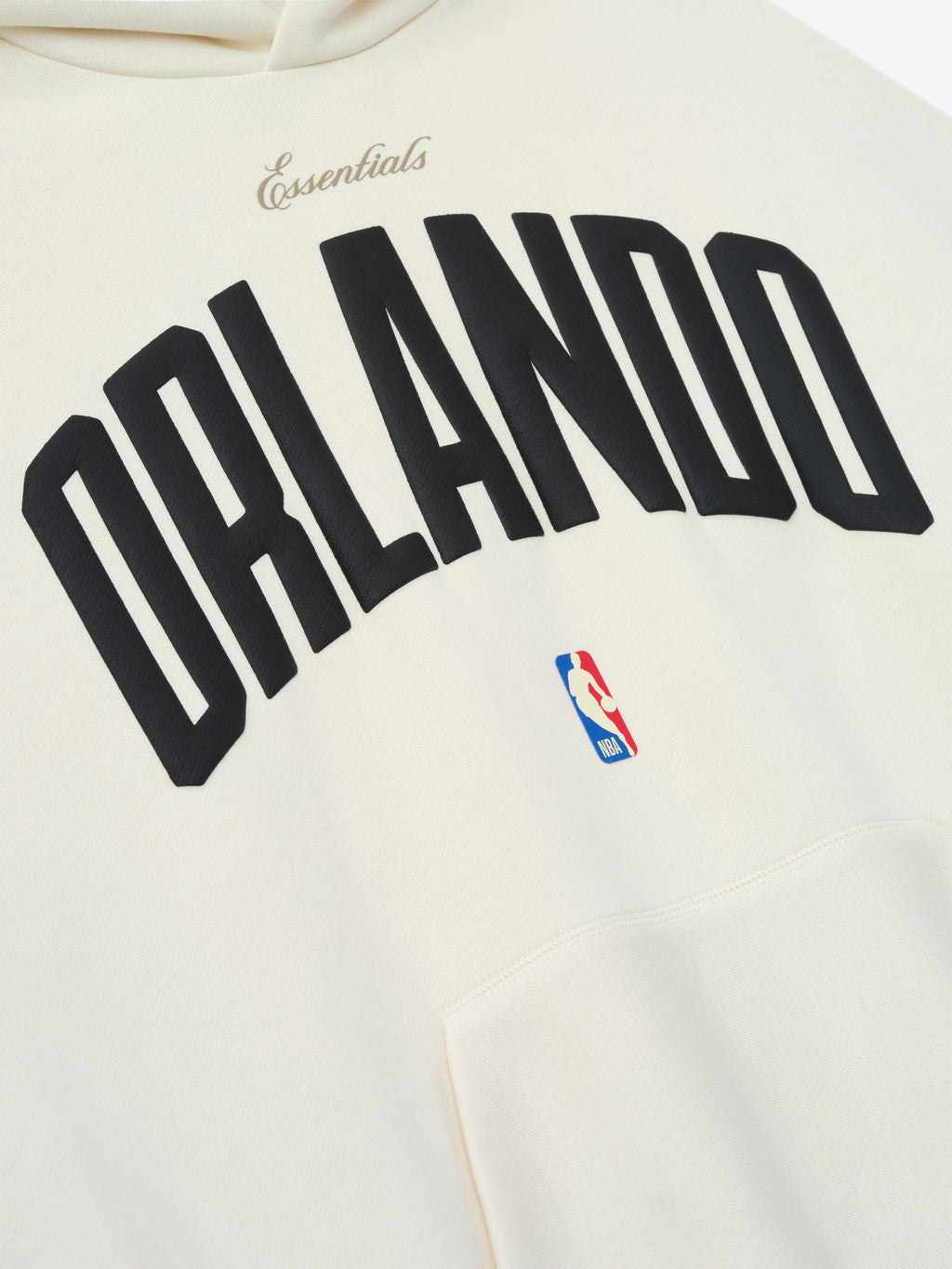 Close-up of cream white Orlando Magic 90s Hoodie with black Orlando text and small NBA logo near pocket, gallery 0.