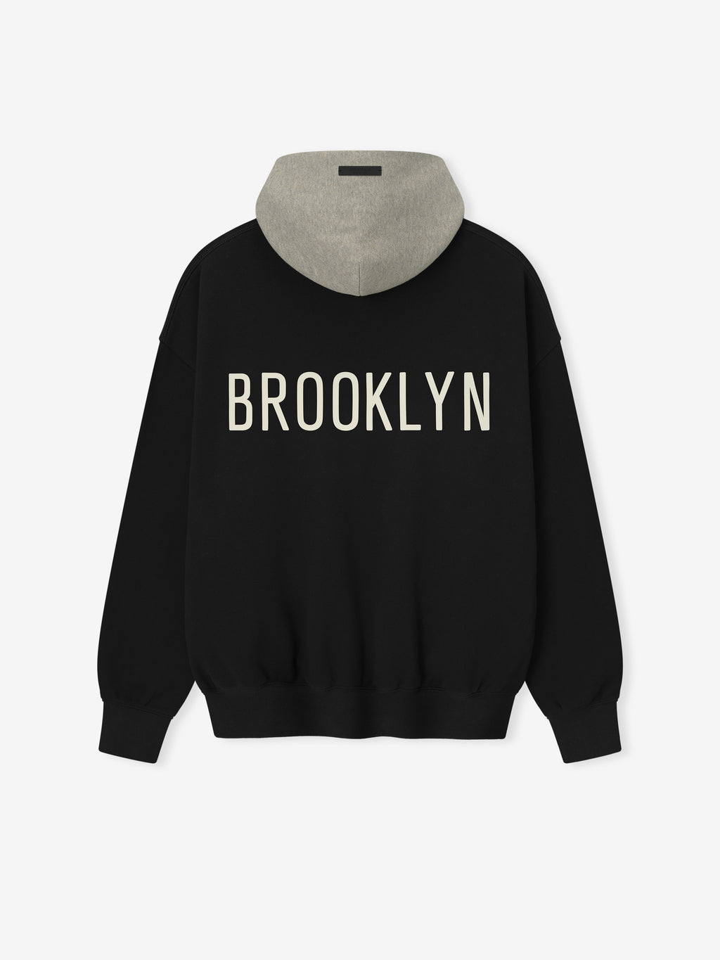 Back view of black Nets Sport Hoodie with grey hood and large cream-colored BROOKLYN lettering across back
