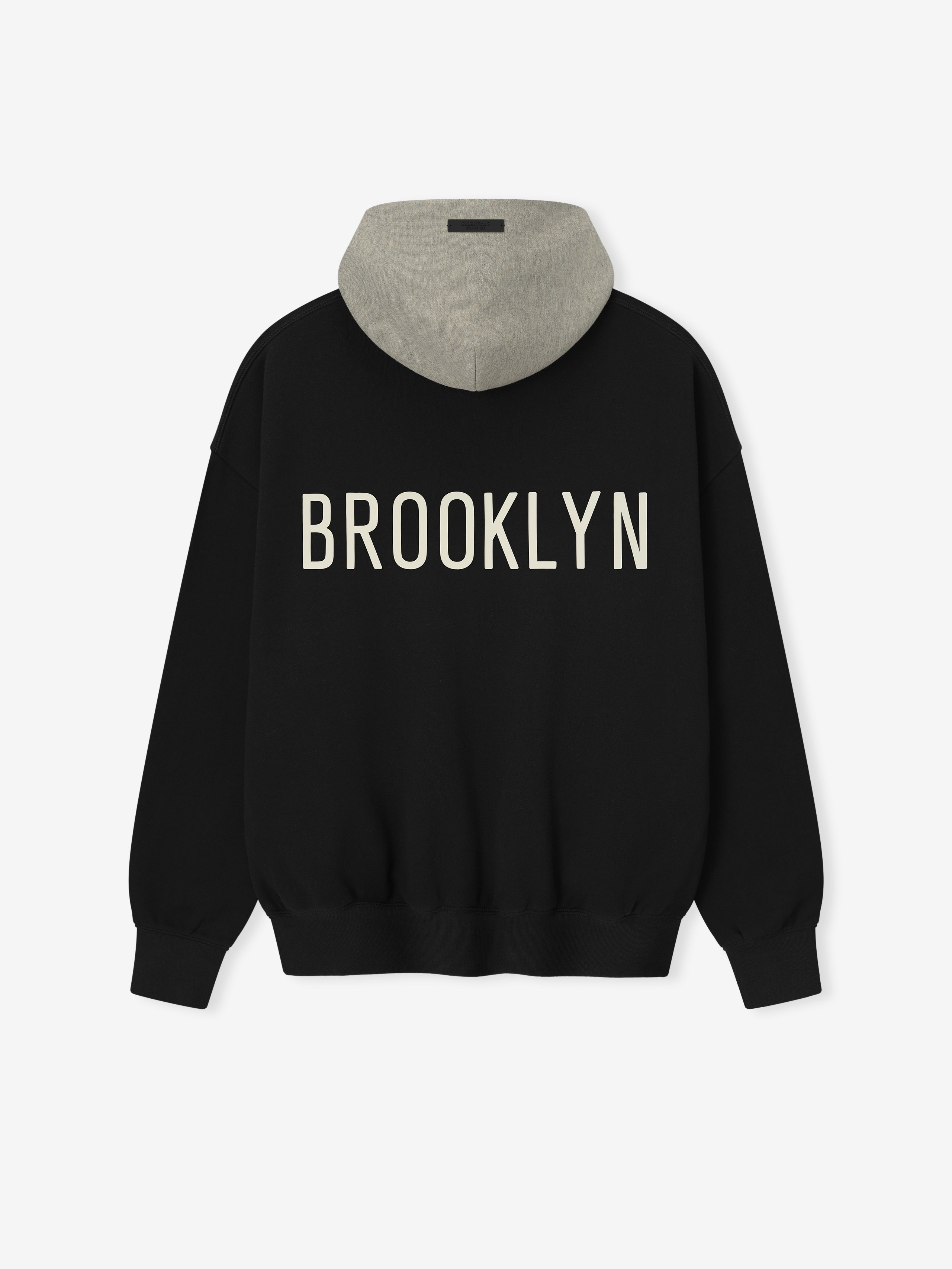 Back view of black Nets Sport Hoodie with grey hood and large cream-colored BROOKLYN lettering across back