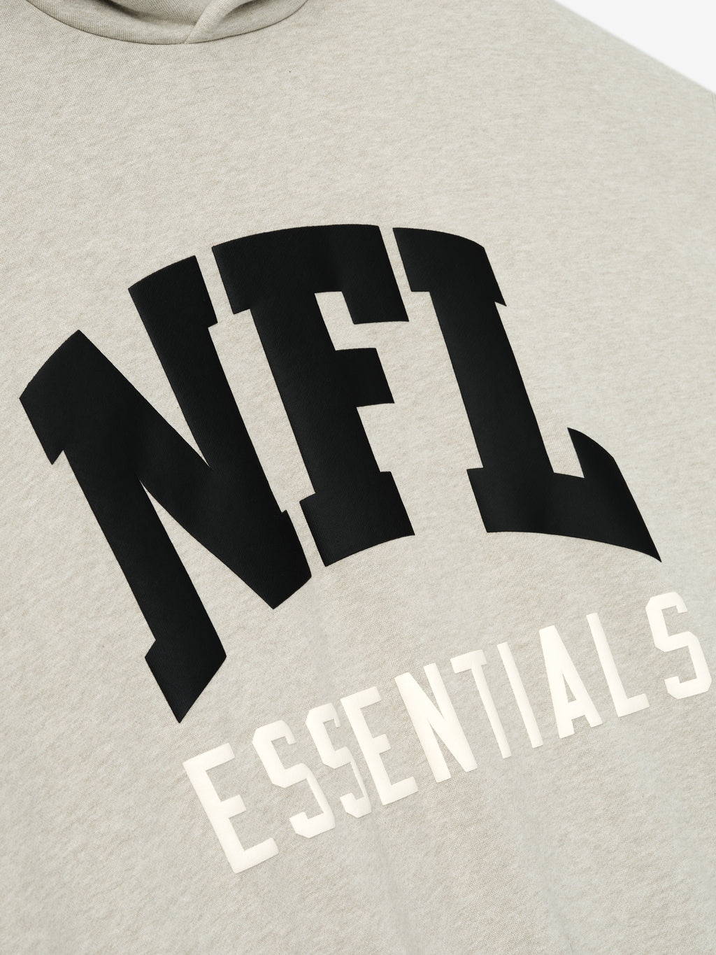 Heather stone NFL Sport Hoodie close-up showing bold black NFL lettering and white Essentials text, gallery image 0