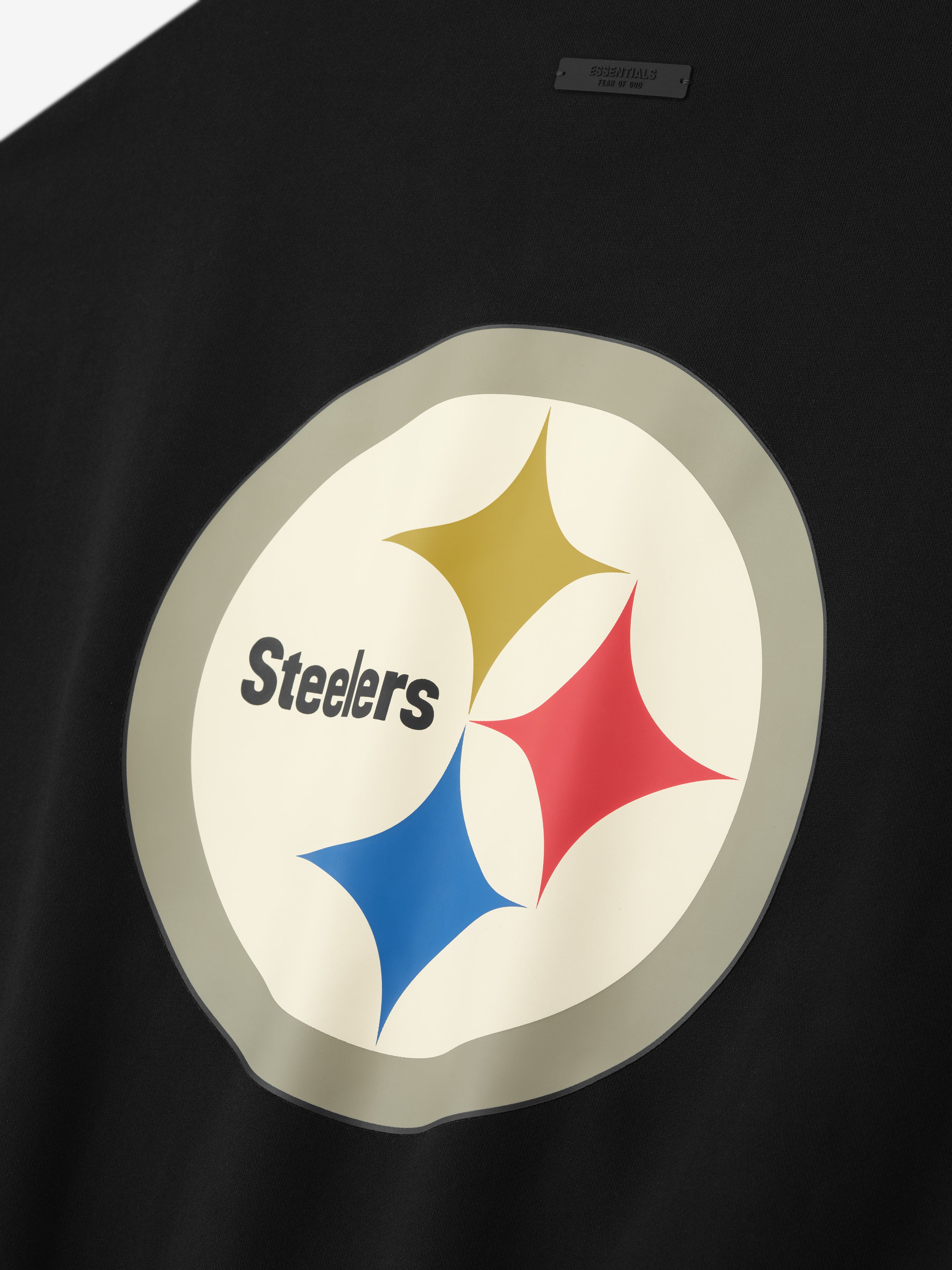 Close-up of black Steelers Sport Crewneck showing large Steelers logo emblem centered on front, gallery 0 image four