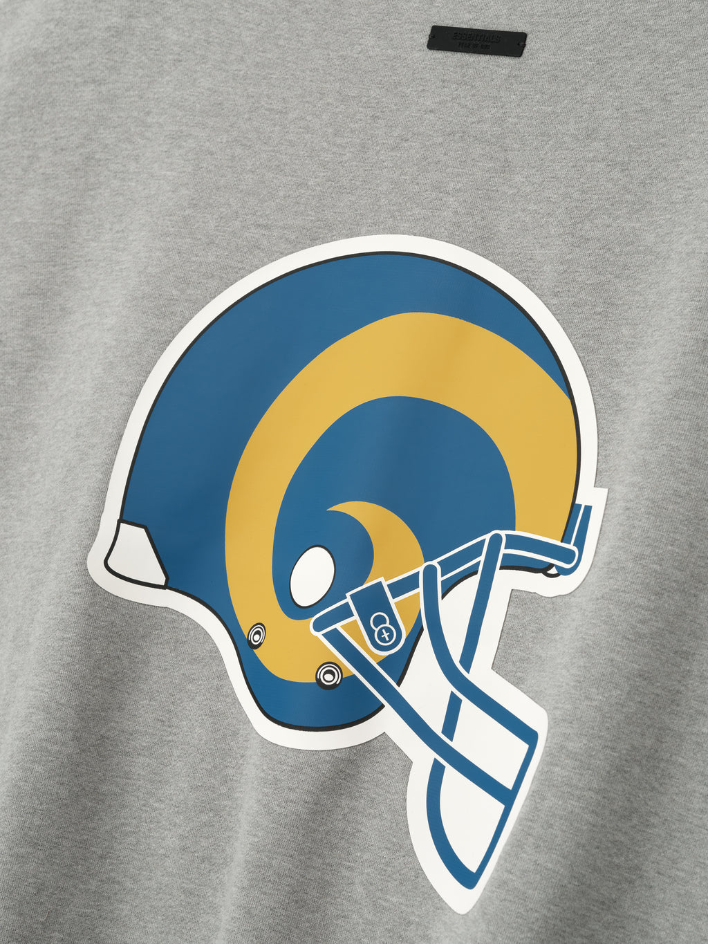 Close-up of concrete heather Rams Sport Crewneck featuring large blue and gold Rams helmet graphic centered on front, gallery 0