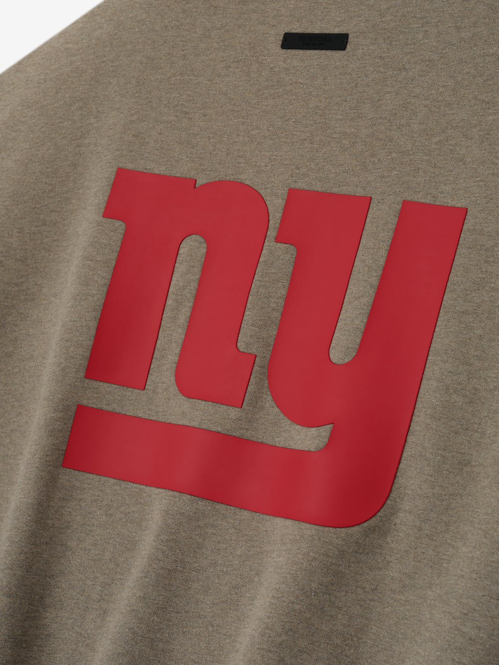 Close-up of homestead heather Giants Sport Crewneck showing large red NY logo centered on front, gallery image 0