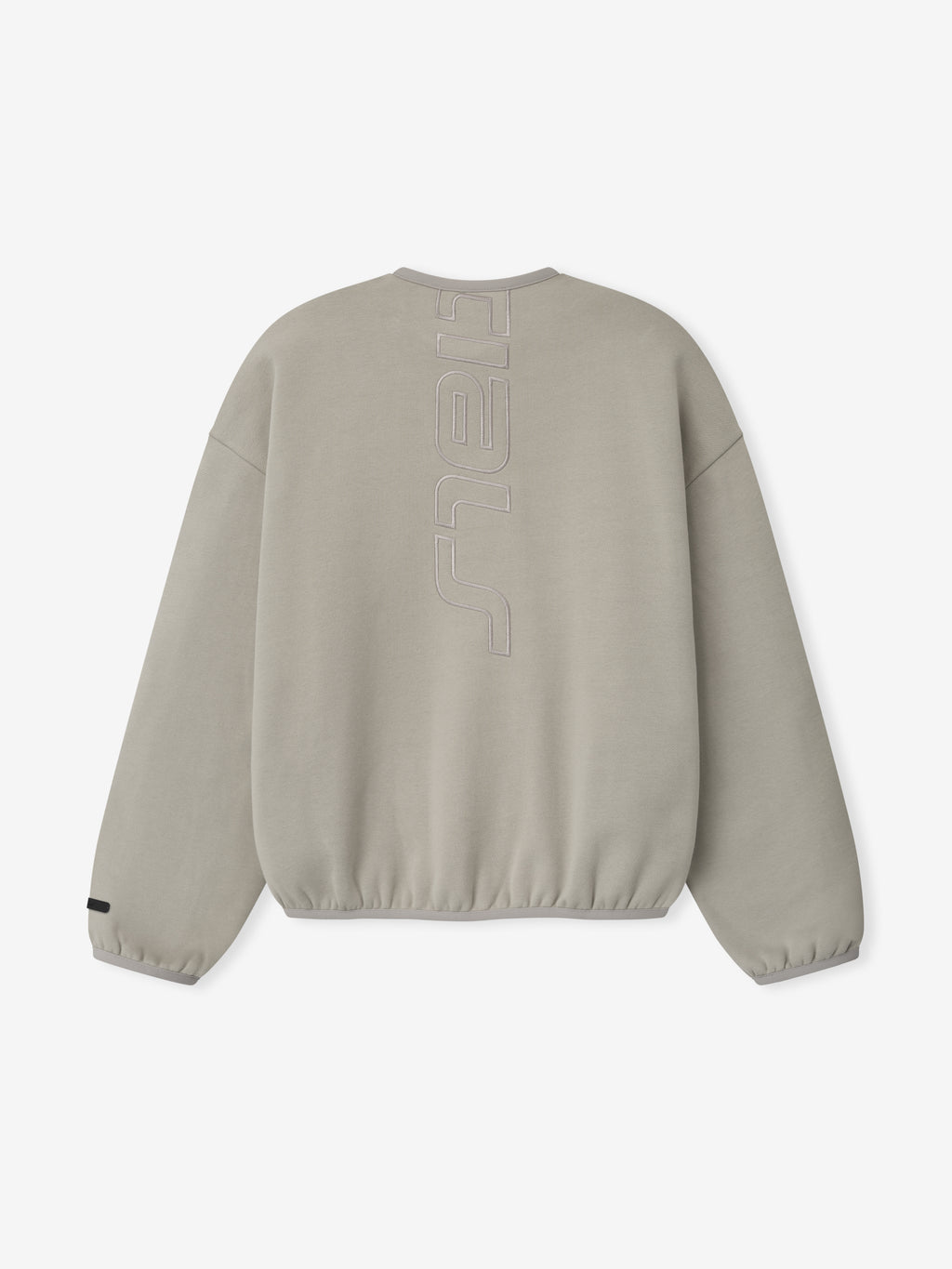 Back view of light taupe sweatshirt with vertical embossed lettering down center and elasticated cuffs and hem
