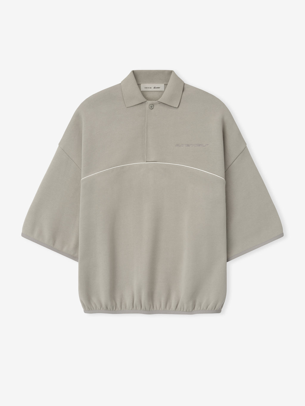 light gray cropped polo sweatshirt with 3/4 wide sleeves, subtle embroidered logo, and white piping across chest