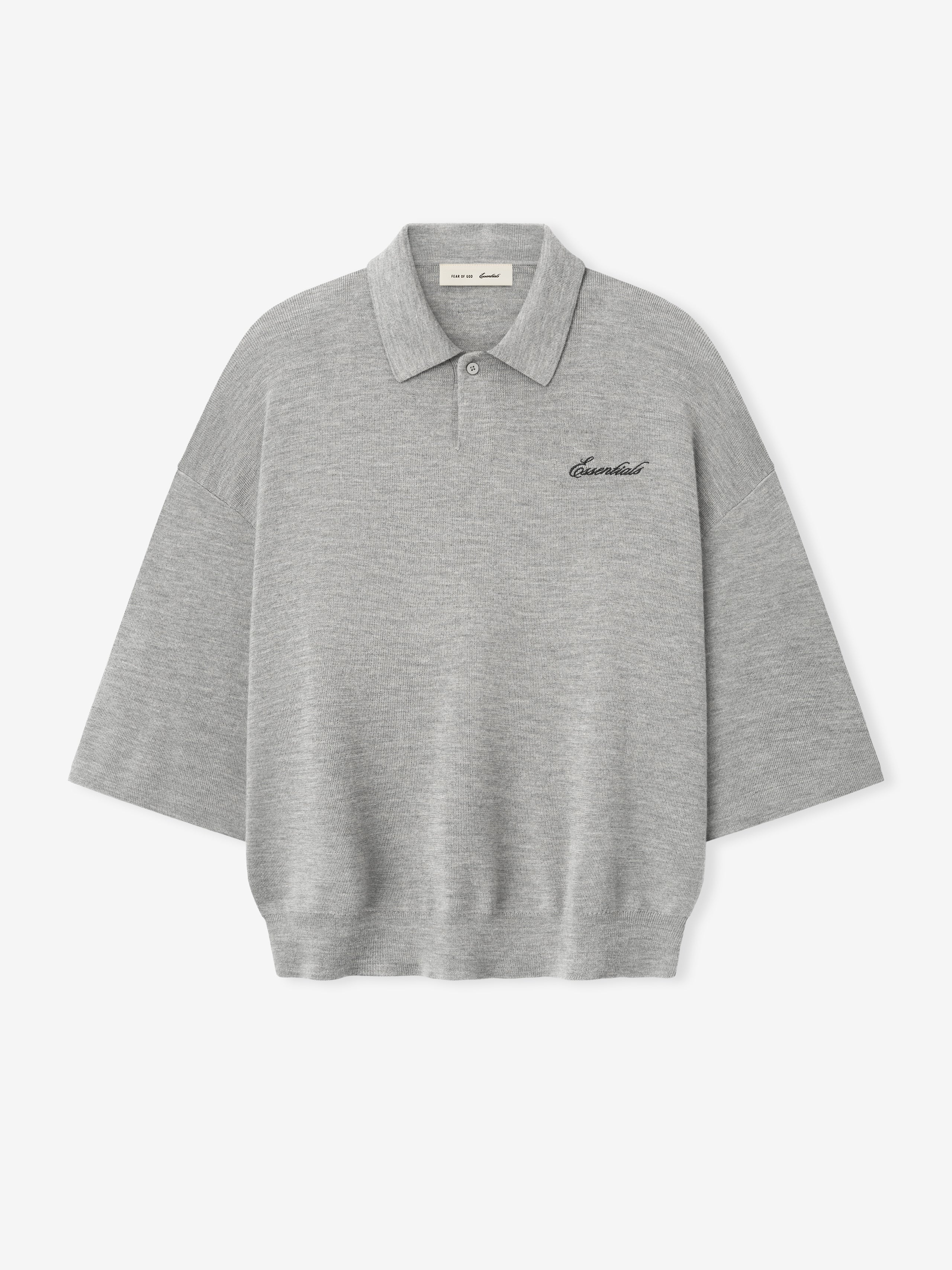 light grey heavy merino knit polo with relaxed fit, 3/4 sleeves, classic collar, and black Essentials signature embroidery on chest