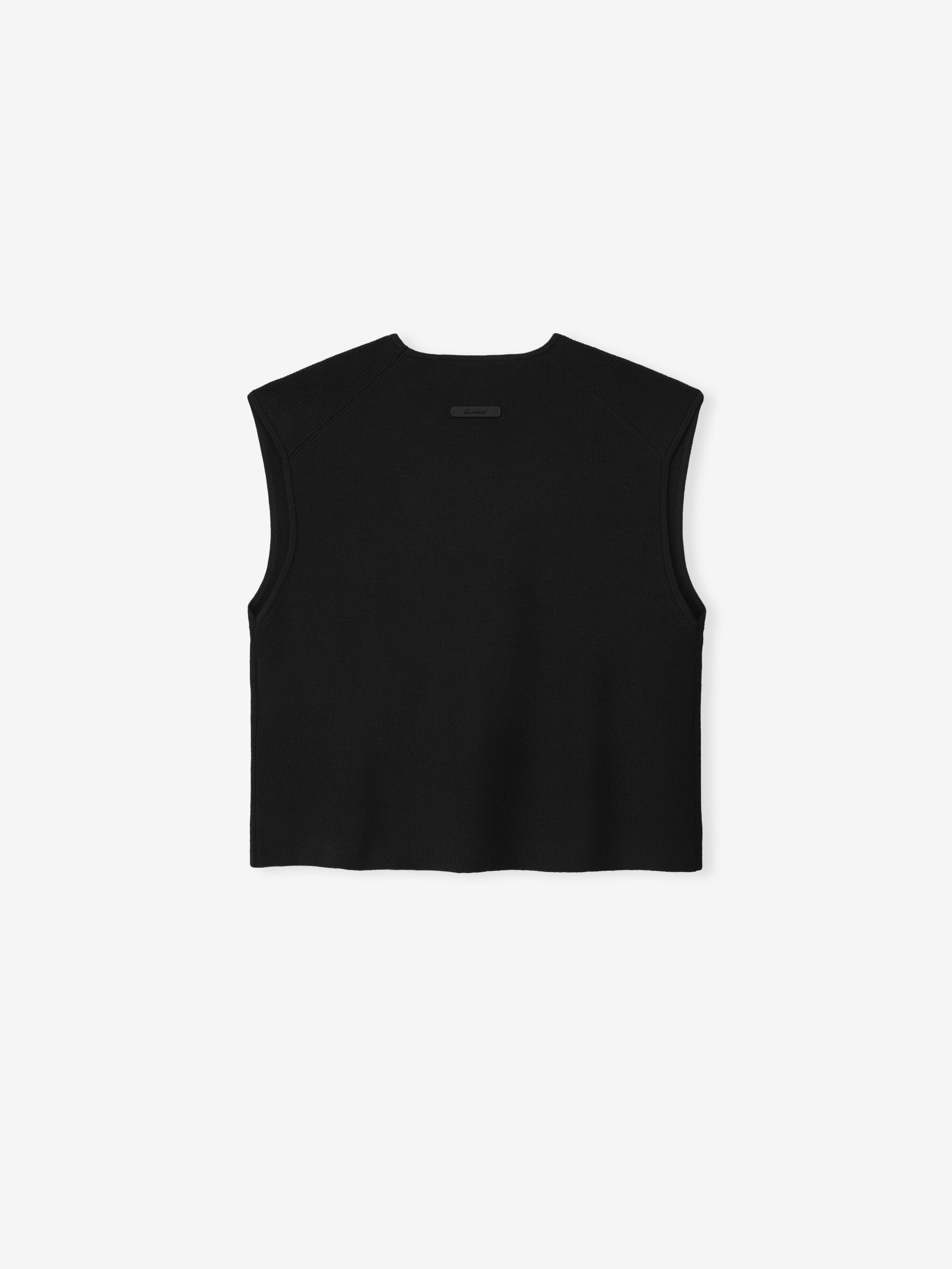Black sleeveless top on a white background