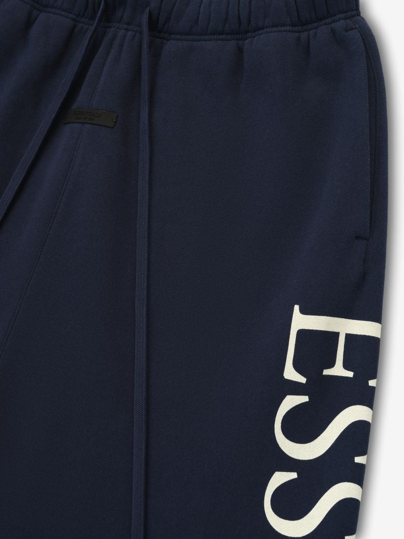 Close-up of navy Howard University Lounge Sweatpant showing partial cream ESS text and elastic waistband, file 4bc7gwWw.jpg