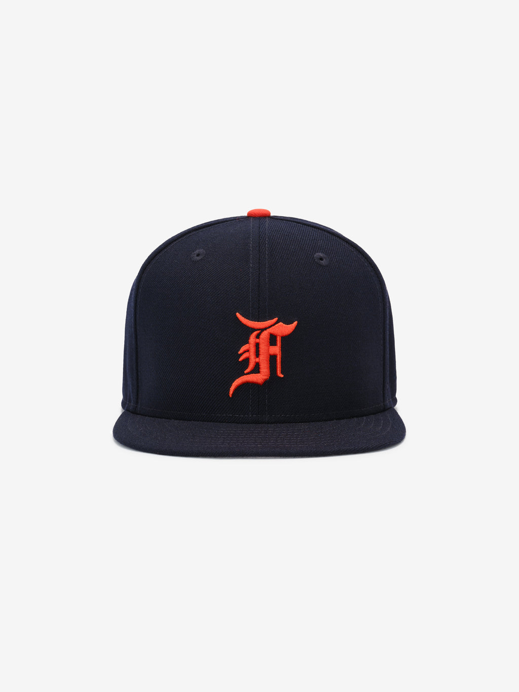 Front view of navy Detroit Tigers cap featuring bright orange Old English D logo and red top button