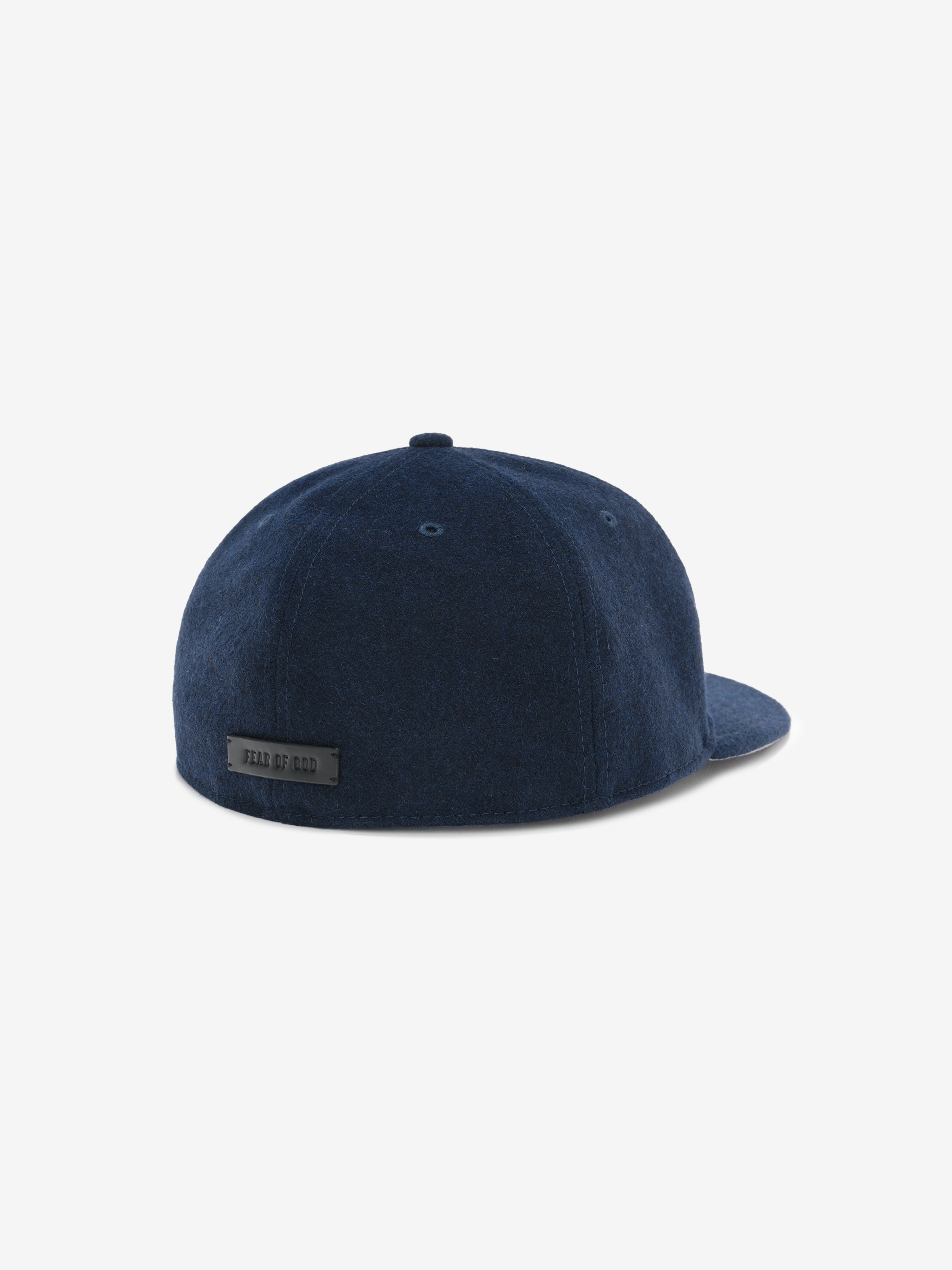 Fear of God Essentials 59FIFTY Retro Fitted National League Cap in rich navy wool blend, featuring a clean back view with subtle branded patch detail.