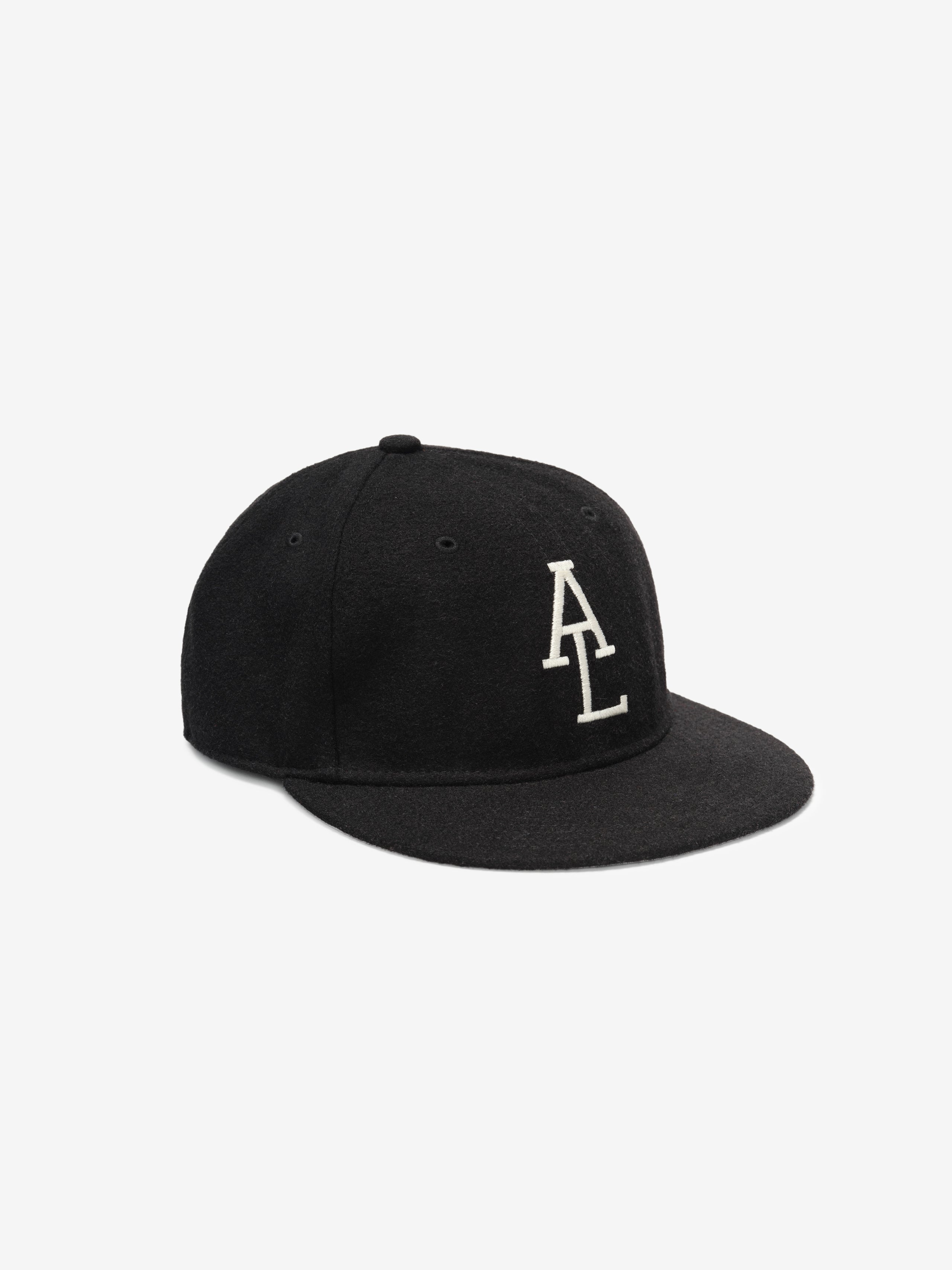 Fear of God Essentials 59FIFTY Retro Fitted American League Cap in black wool blend with a structured six-panel design and white embroidered AL logo on the front.