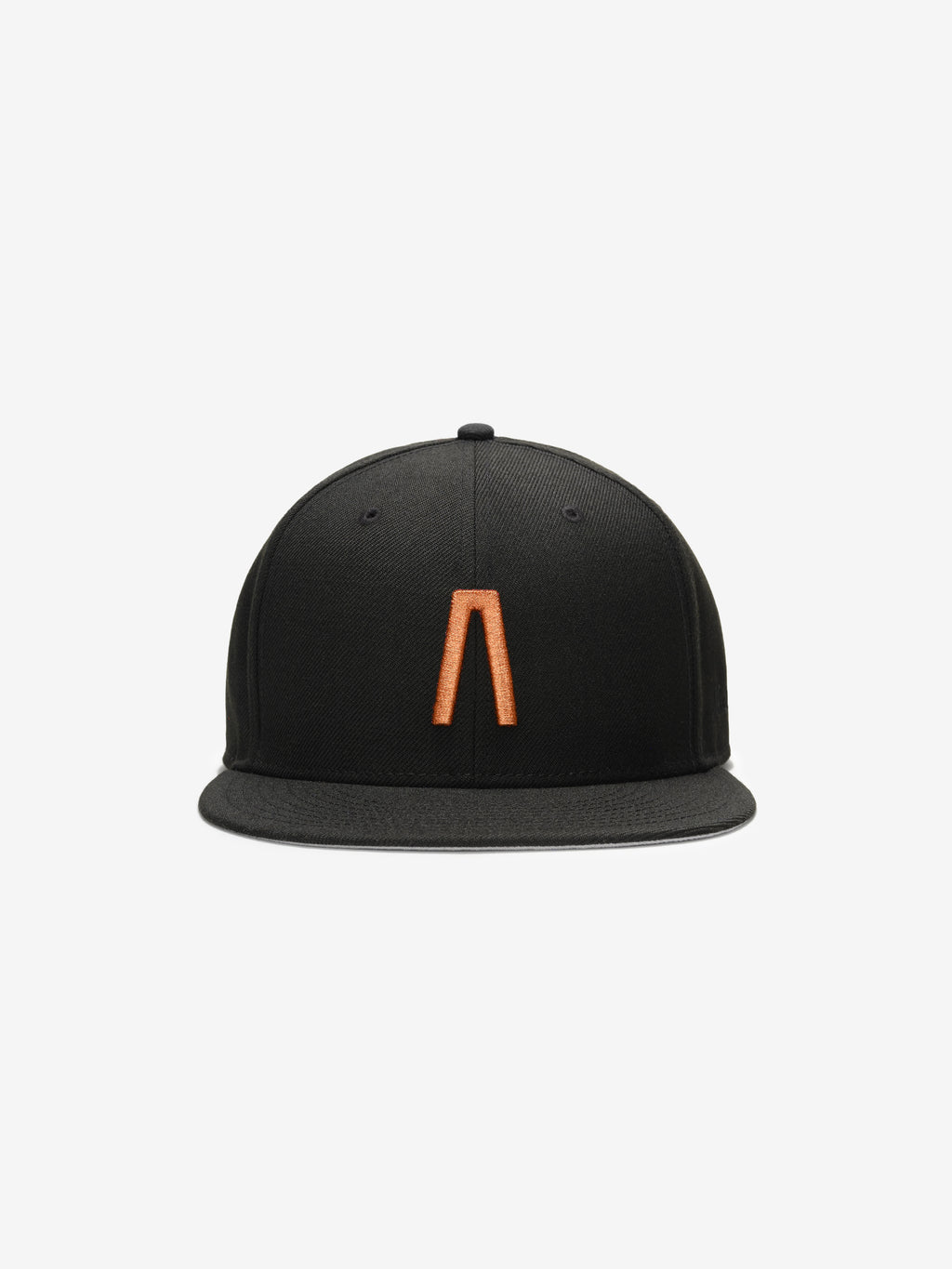 Fear of God Essentials 59FIFTY Athletics Cap featuring a solid black crown with a bold orange minimalist emblem on the front panel and a structured flat brim.