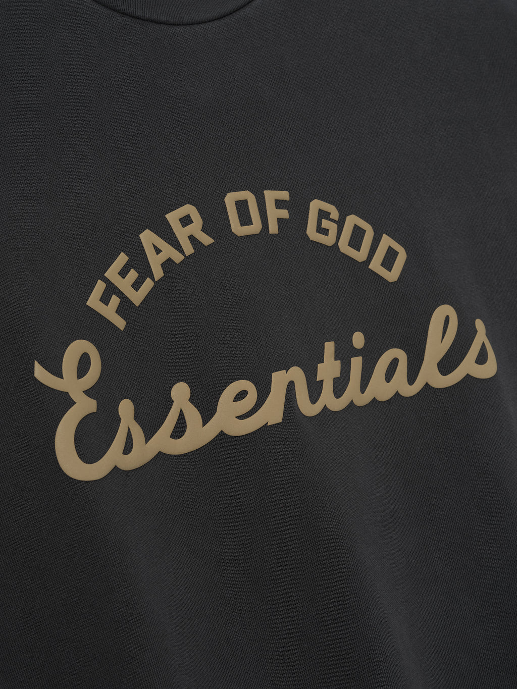 Black t-shirt with 'Fear of God Essentials' text in beige.