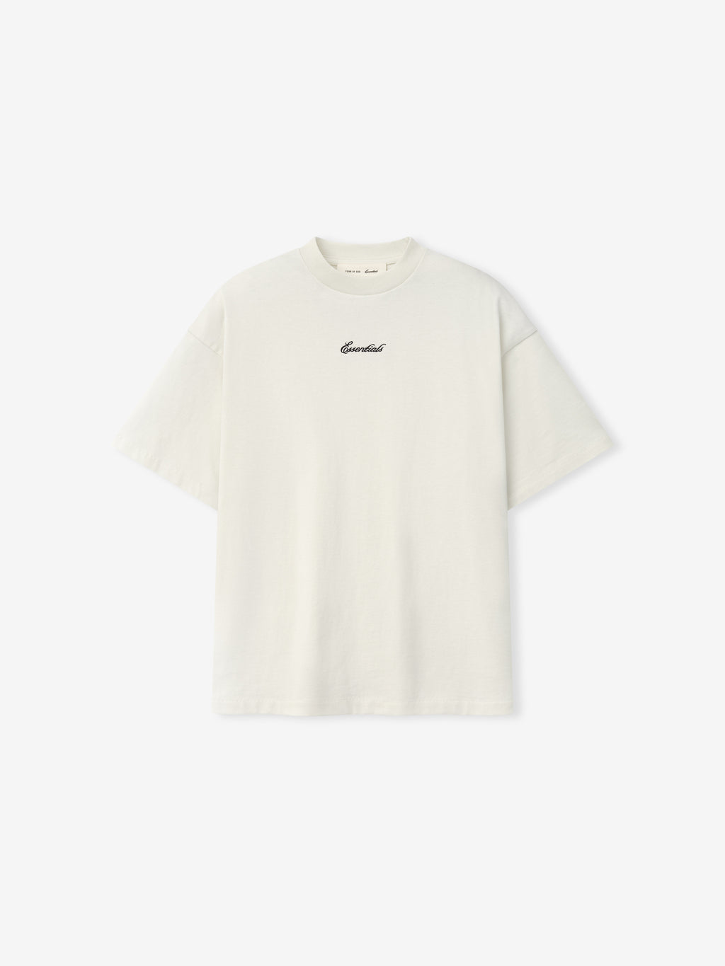 Kids Signature 90s Tee in a soft ivory fabric with a relaxed fit, featuring black cursive Essentials embroidery on the chest for a timeless casual kids' top.